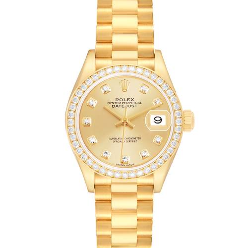 The Rolex President 279138 Women's Yellow Gold Champagne Dial model is shown from a top-down angle, displaying its gold bracelet, diamond bezel, and dial with date display.