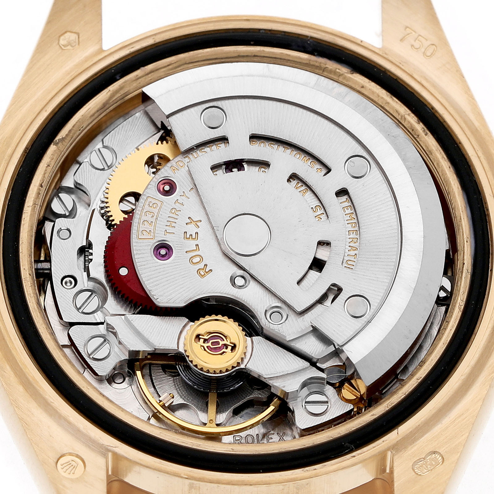The image shows the internal mechanism of a Rolex President 279138 Women's Yellow Gold Champagne Dial watch from a top-down angle, highlighting its movement components.