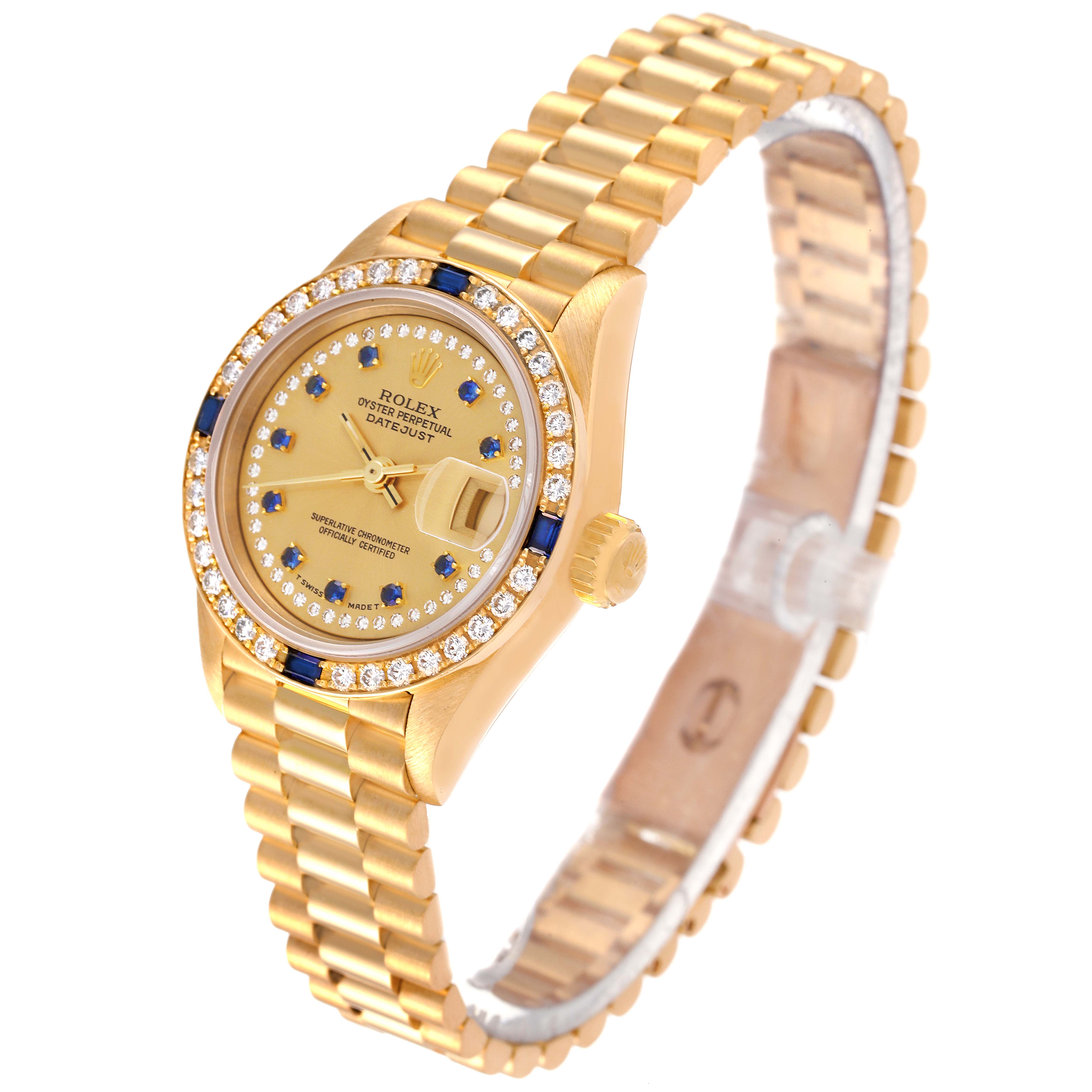 The Rolex President 69088 Women
s Yellow Gold Champagne Dial 69088 Women
s Yellow Gold Champagne Dial model watch is shown at an angle highlighting its gold bracelet, bezel, dial, and crown.