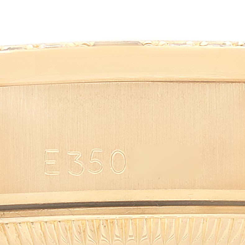 This image shows a close-up of the bracelet
s inner side and clasp with an engraving on the Rolex President 69088 Women
s Yellow Gold Champagne Dial 69088 Women
s Yellow Gold Champagne Dial model watch.