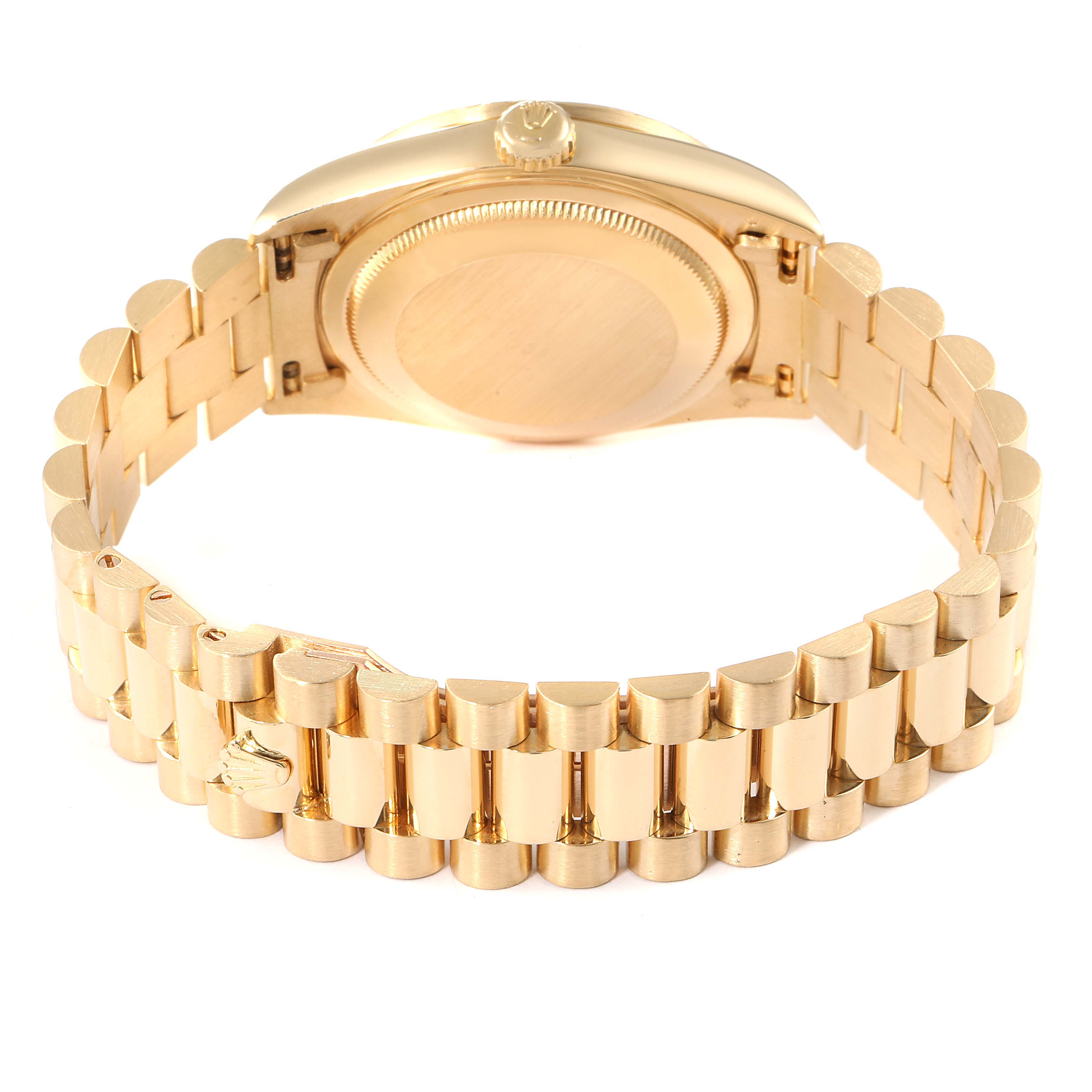 This image shows the backside of the Rolex President 18388 Men
s Yellow Gold Black Dial 18388 Men
s Yellow Gold Black Dial model watch, highlighting the bracelet, clasp, and case back.