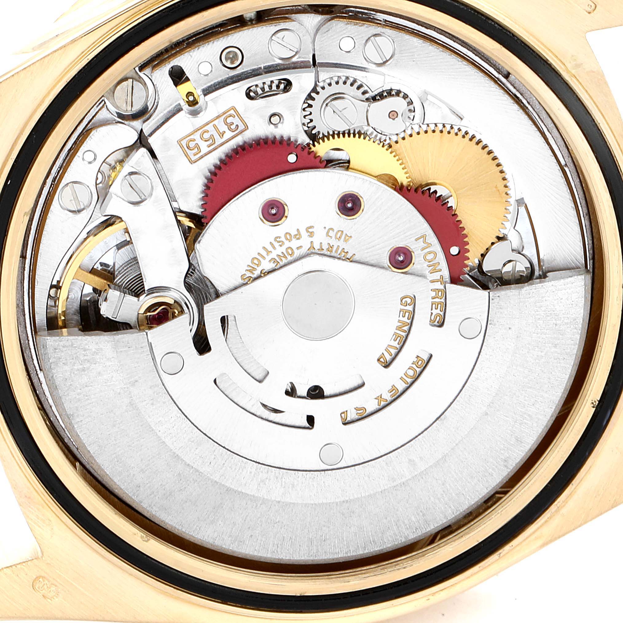 The image shows the inner mechanical movement of a Rolex President 18388 Men
s Yellow Gold Black Dial 18388 Men
s Yellow Gold Black Dial model watch viewed from the back.