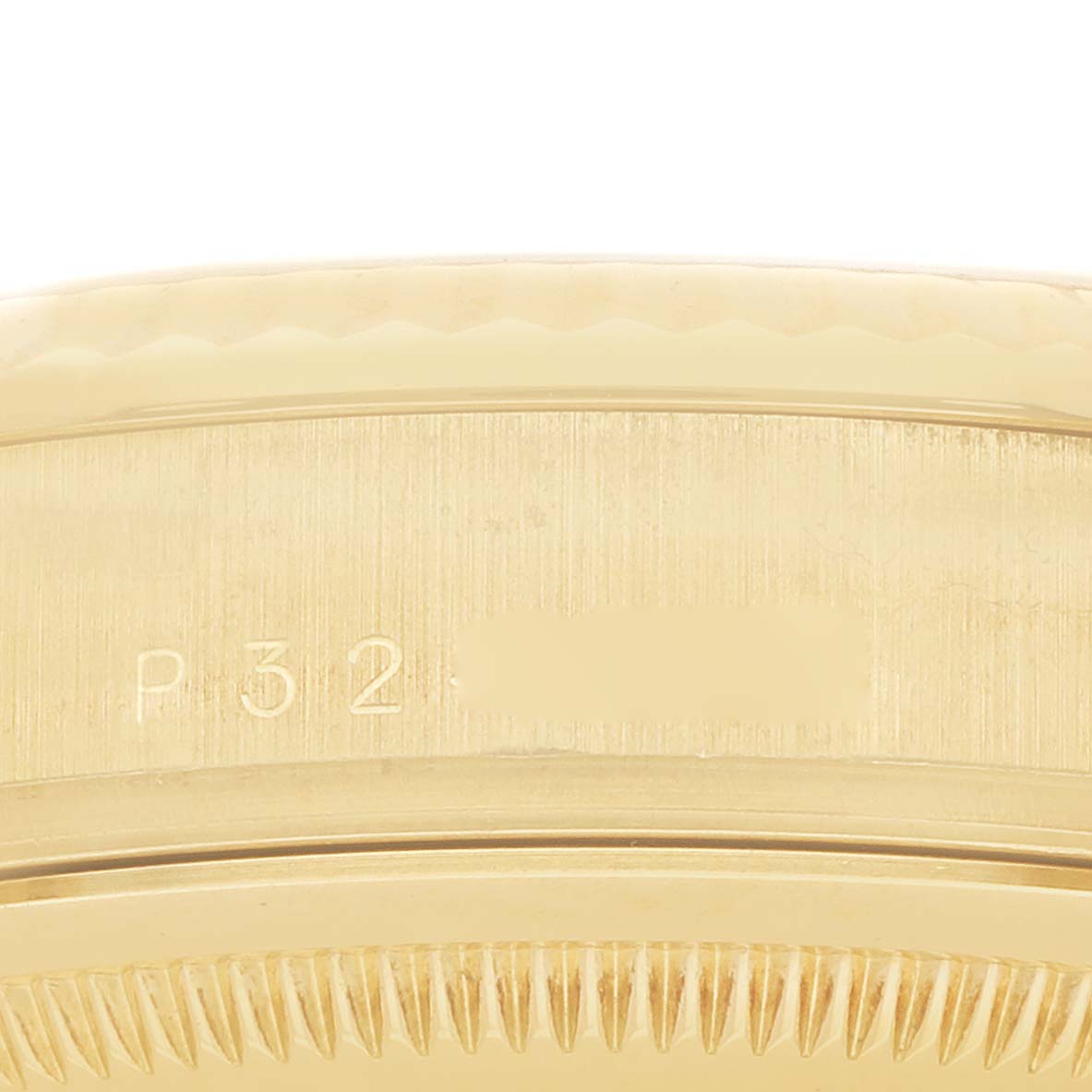 The image shows a close-up of the side of a Rolex President 118238 Men's Yellow Gold Champagne Dial watch, focusing on the edge and reference number engraving.