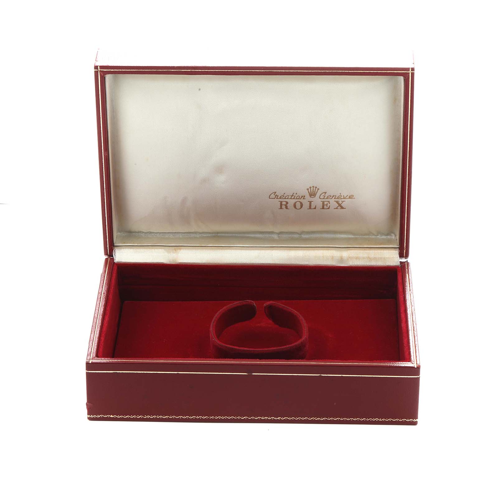 This image shows an open red Rolex watch box for the President model, with a padded interior designed to hold the watch.