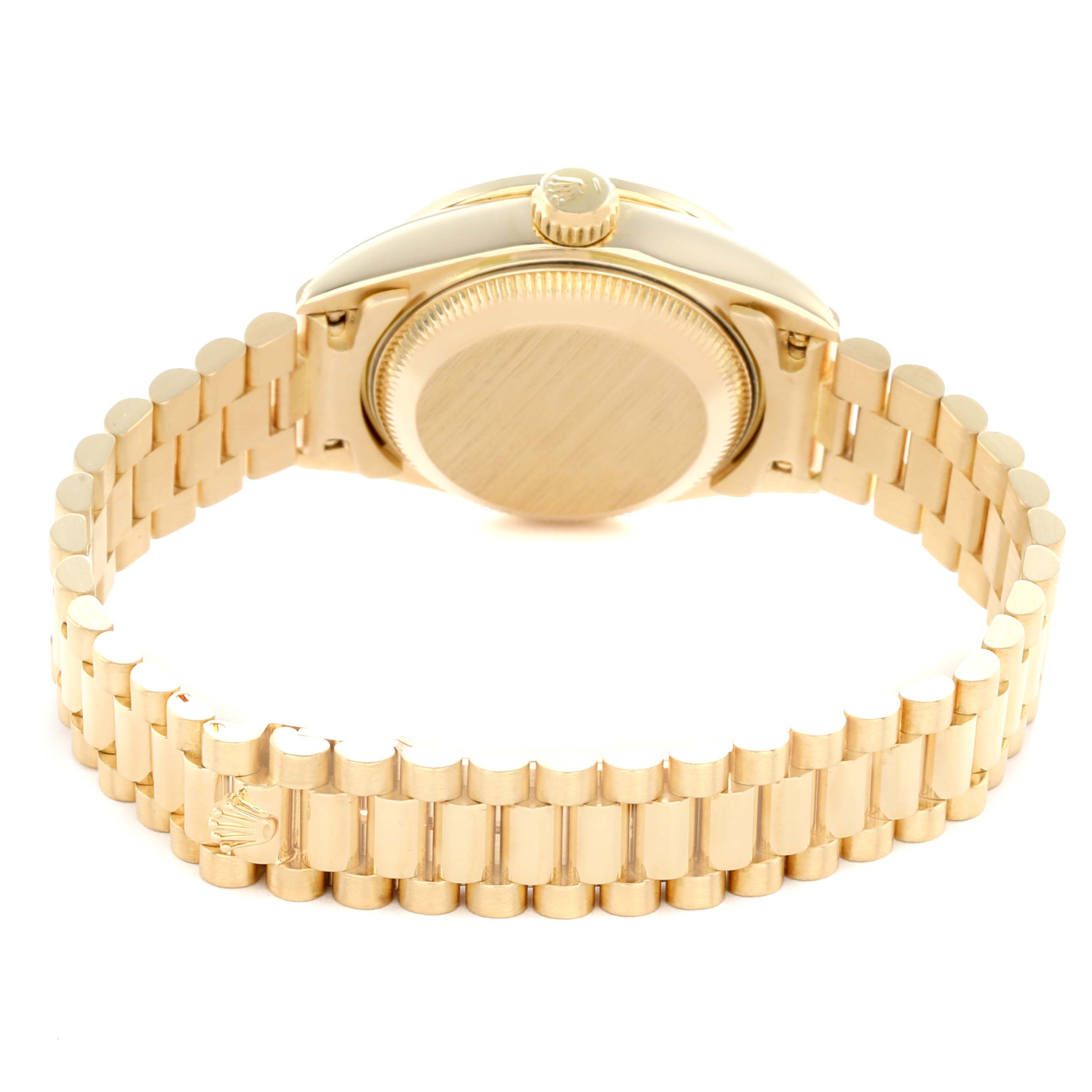 The Rolex President 69158 Women
s Yellow Gold Champagne Dial model is shown from the rear, highlighting the case back and gold bracelet.