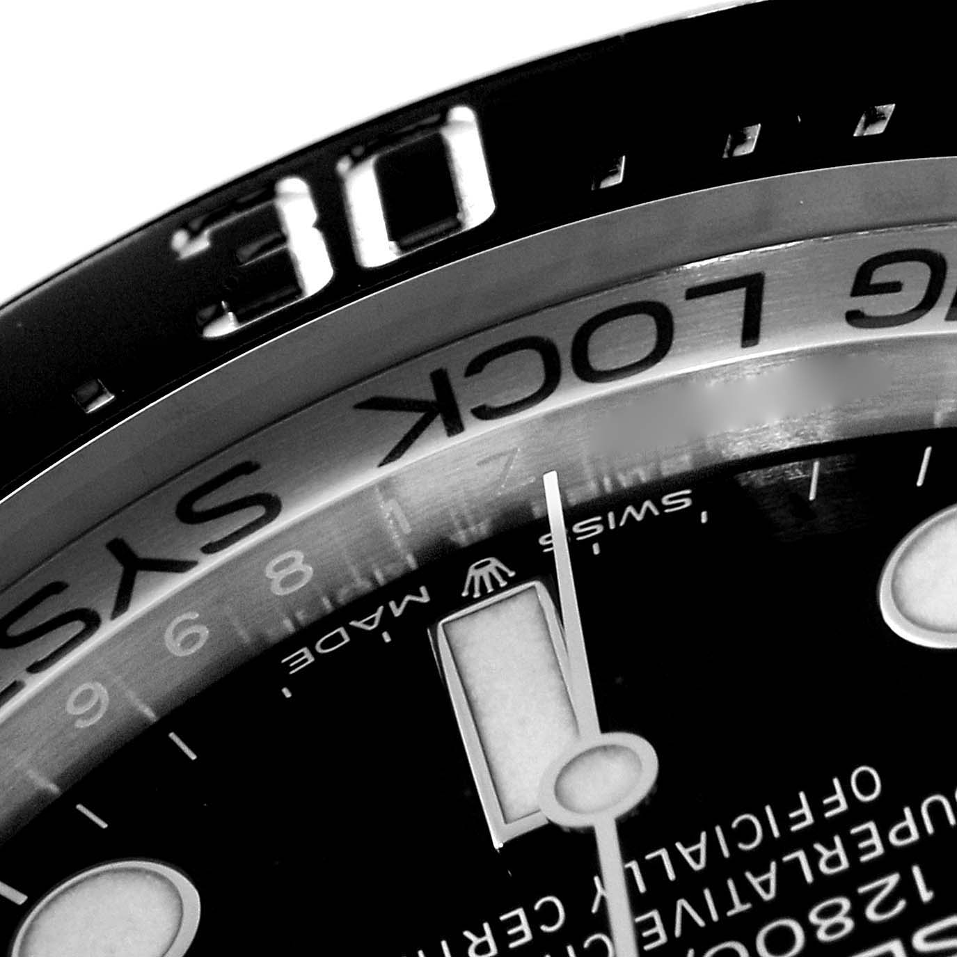 This close-up angle of the Rolex Sea-Dweller 126660 Men
s Stainless Steel Blue Dial 126660 Men
s Stainless Steel Blue Dial watch shows the bezel, part of the dial, and hands.