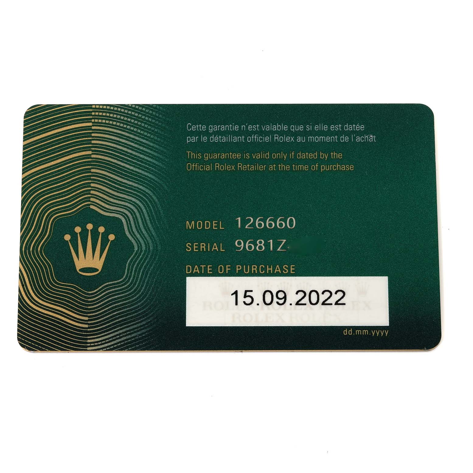 This image shows a warranty card for the Rolex Sea-Dweller 126660 Men
s Stainless Steel Blue Dial 126660 Men
s Stainless Steel Blue Dial model 126660.