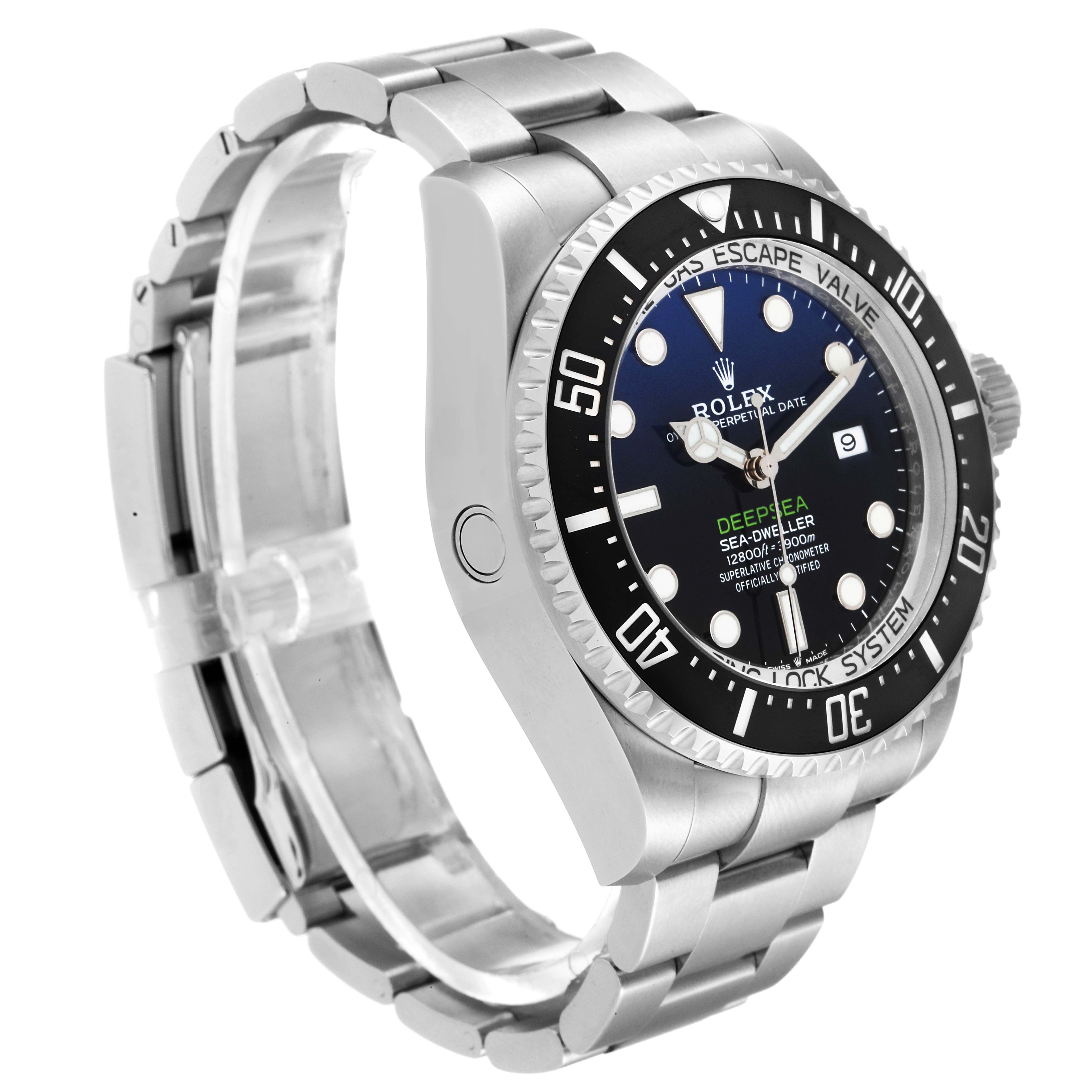 The Rolex Sea-Dweller 126660 Men
s Stainless Steel Blue Dial 126660 Men
s Stainless Steel Blue Dial watch is shown at an angle highlighting the dial, bezel, and stainless steel bracelet.