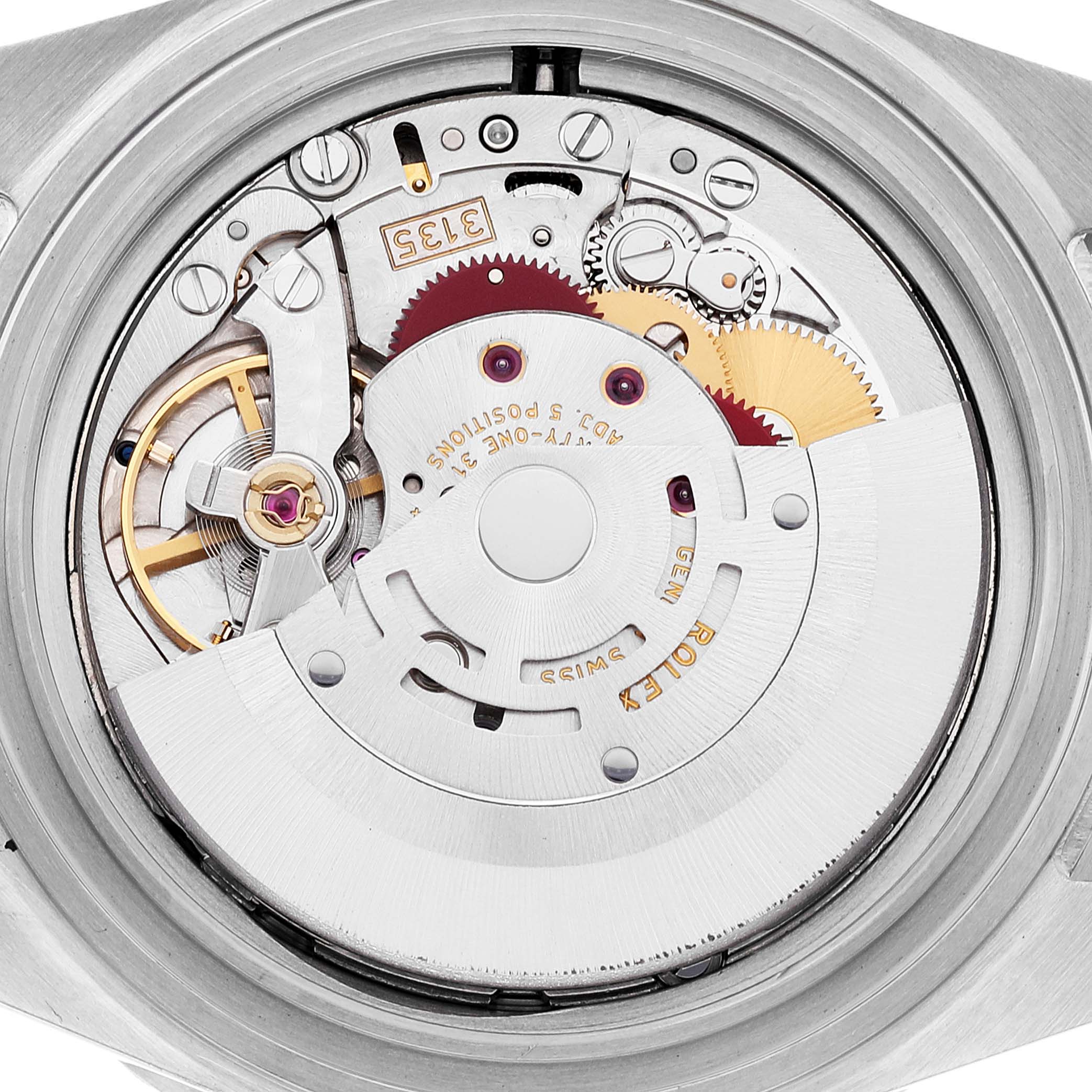 The image shows the internal movement mechanism of a Rolex Submariner 16610 Men
s Stainless Steel Black Dial 16610 Men
s Stainless Steel Black Dial watch from a close-up, top-down angle.