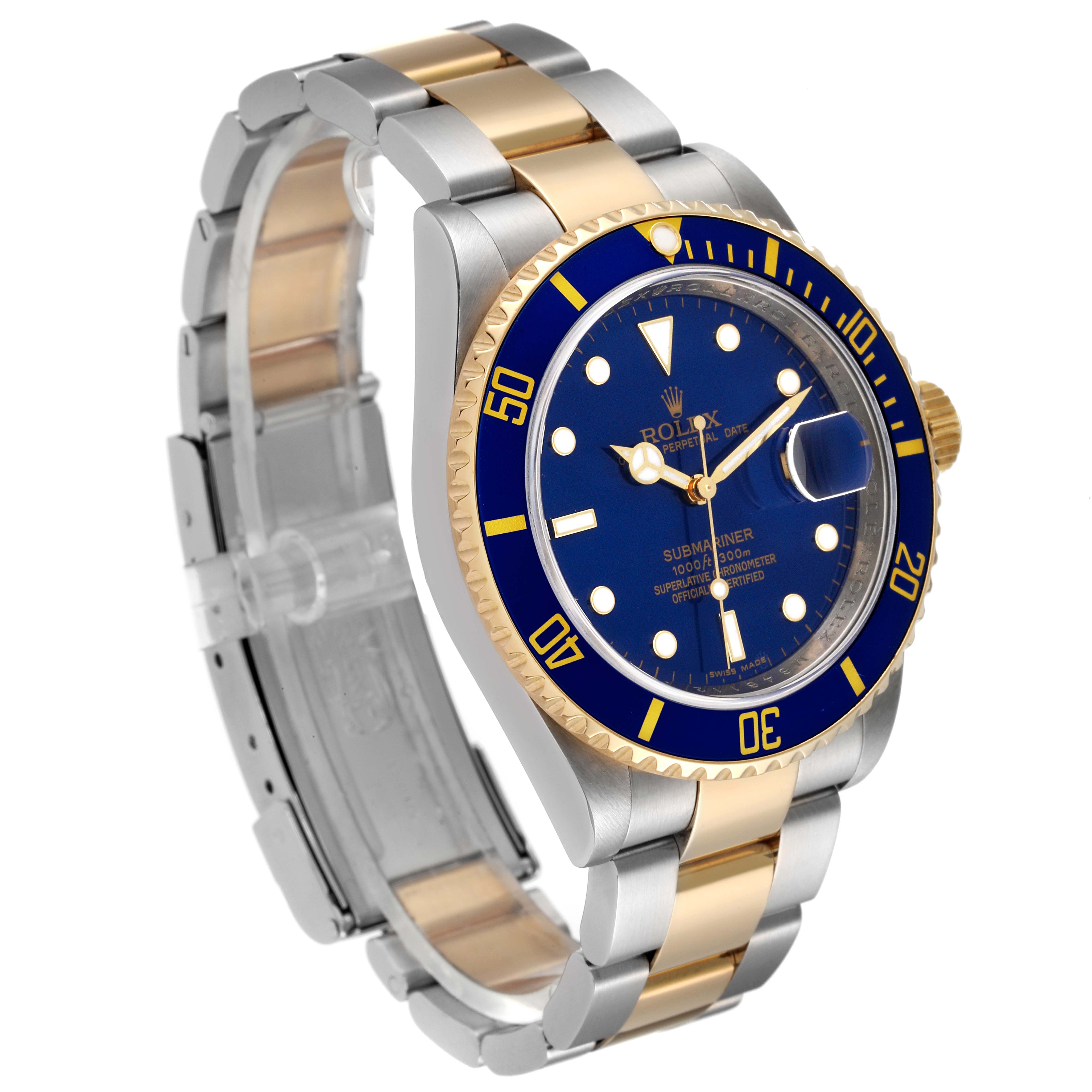 The Rolex Submariner 16613 Men
s Stainless Steel Blue Dial 16613 Men
s Stainless Steel Blue Dial watch is shown at an angle displaying the blue dial, bezel, and two-tone bracelet.