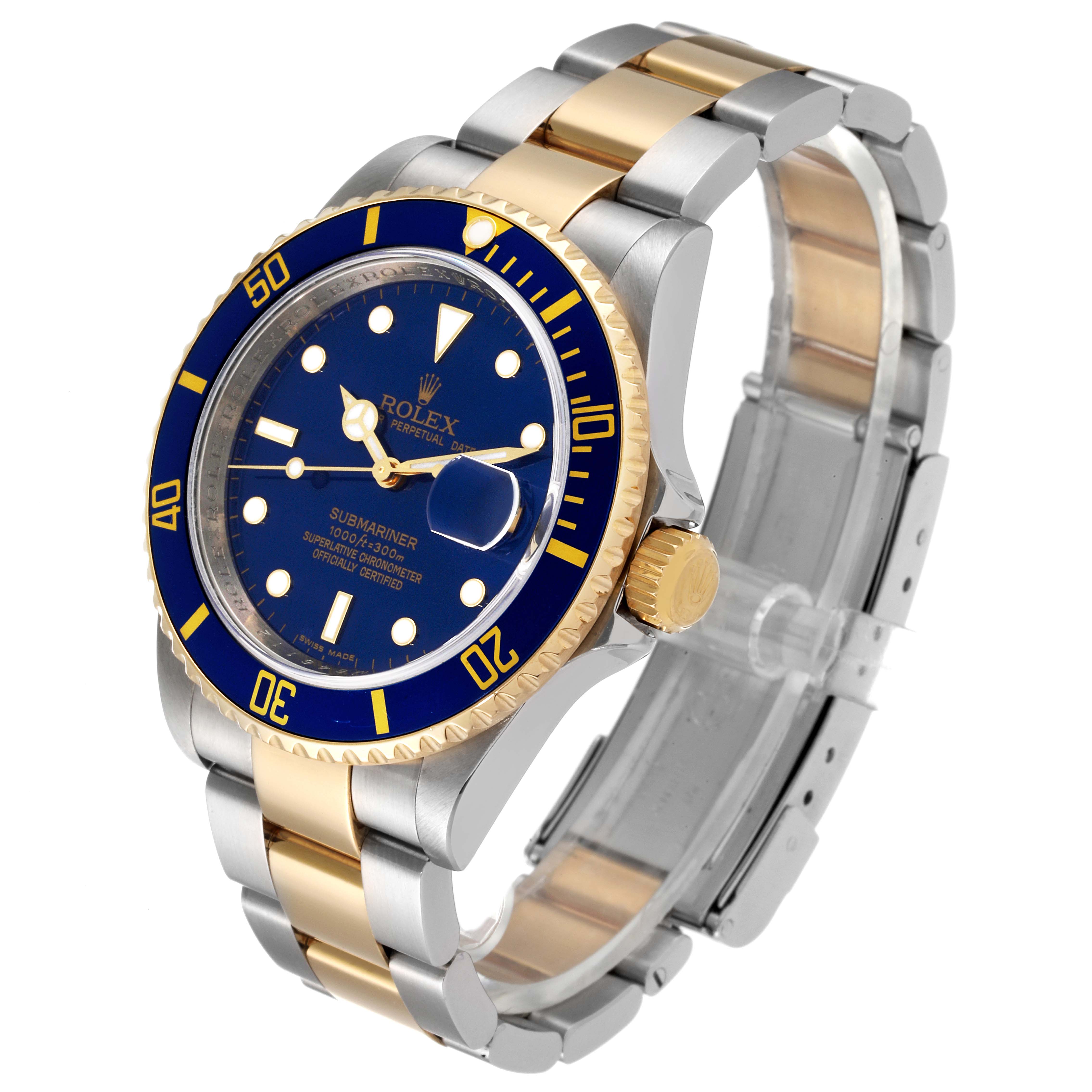 The image shows a Rolex Submariner 16613 Men
s Stainless Steel Blue Dial 16613 Men
s Stainless Steel Blue Dial watch at an angled side view, highlighting the blue dial, gold bezel, crown, and two-tone metal bracelet.