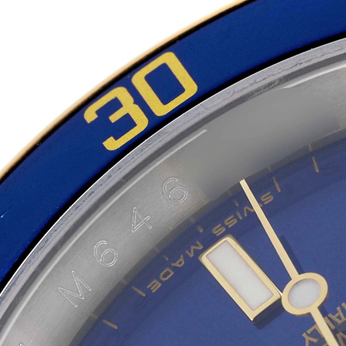 This close-up image shows the bezel and part of the dial of a Rolex Submariner 16613 Men
s Stainless Steel Blue Dial 16613 Men
s Stainless Steel Blue Dial watch, highlighting the 30-minute mark.