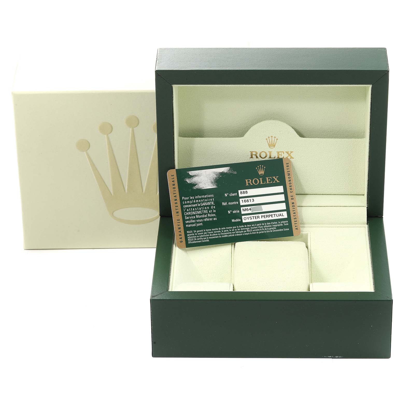 The image shows an open green Rolex Submariner 16613 Men
s Stainless Steel Blue Dial 16613 Men
s Stainless Steel Blue Dial watch box with its Best Quality
ity card and a closed outer cream-colored box.