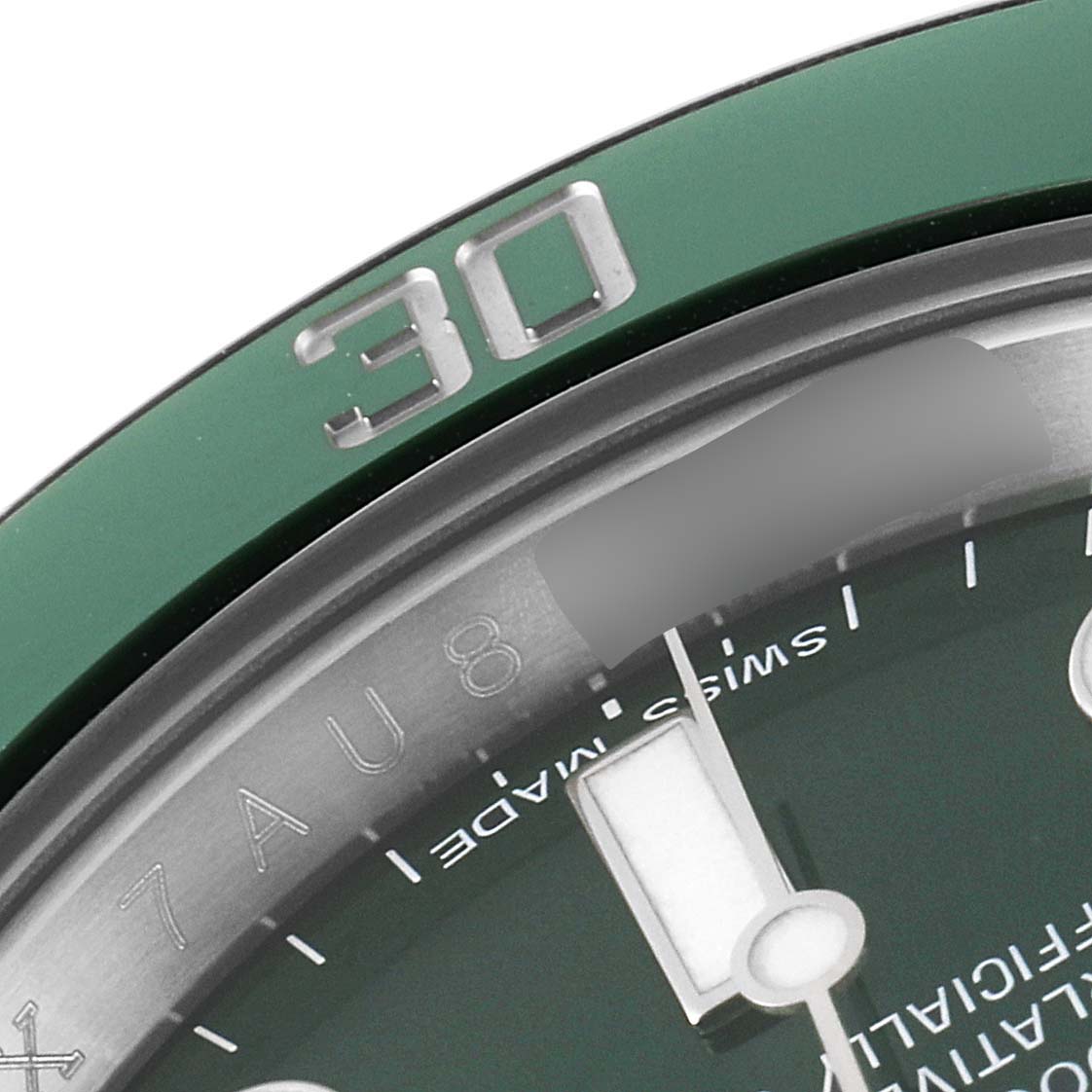 The image shows a close-up of the bezel and part of the dial of a Rolex Submariner 116610LV Men
s Stainless Steel Green Dial 116610LV Men
s Stainless Steel Green Dial watch, highlighting the 30-minute mark.