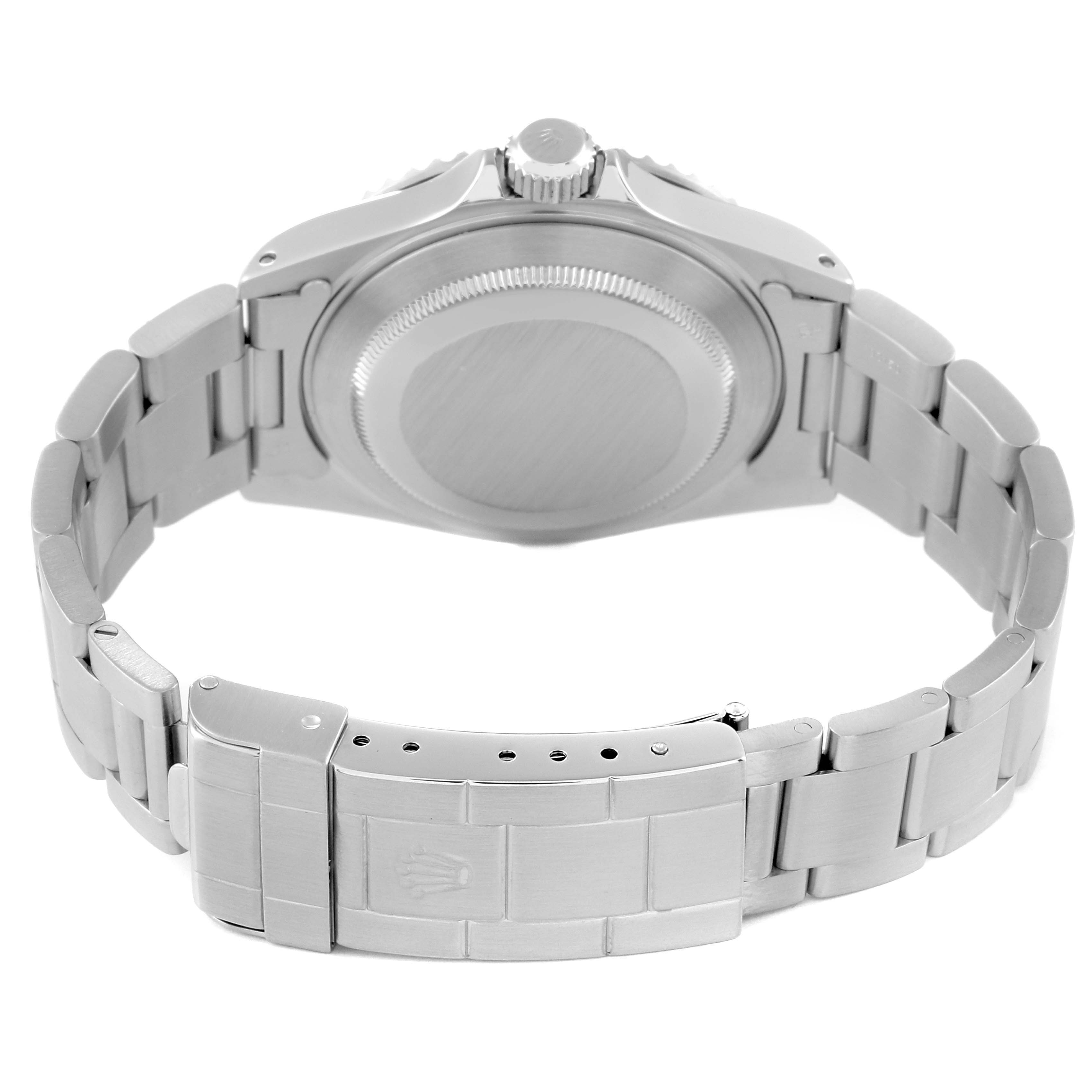 The image shows the back view of a Rolex Submariner 14060 Men
s Stainless Steel Black Dial 14060 Men
s Stainless Steel Black Dial watch, highlighting the stainless steel bracelet and case back.