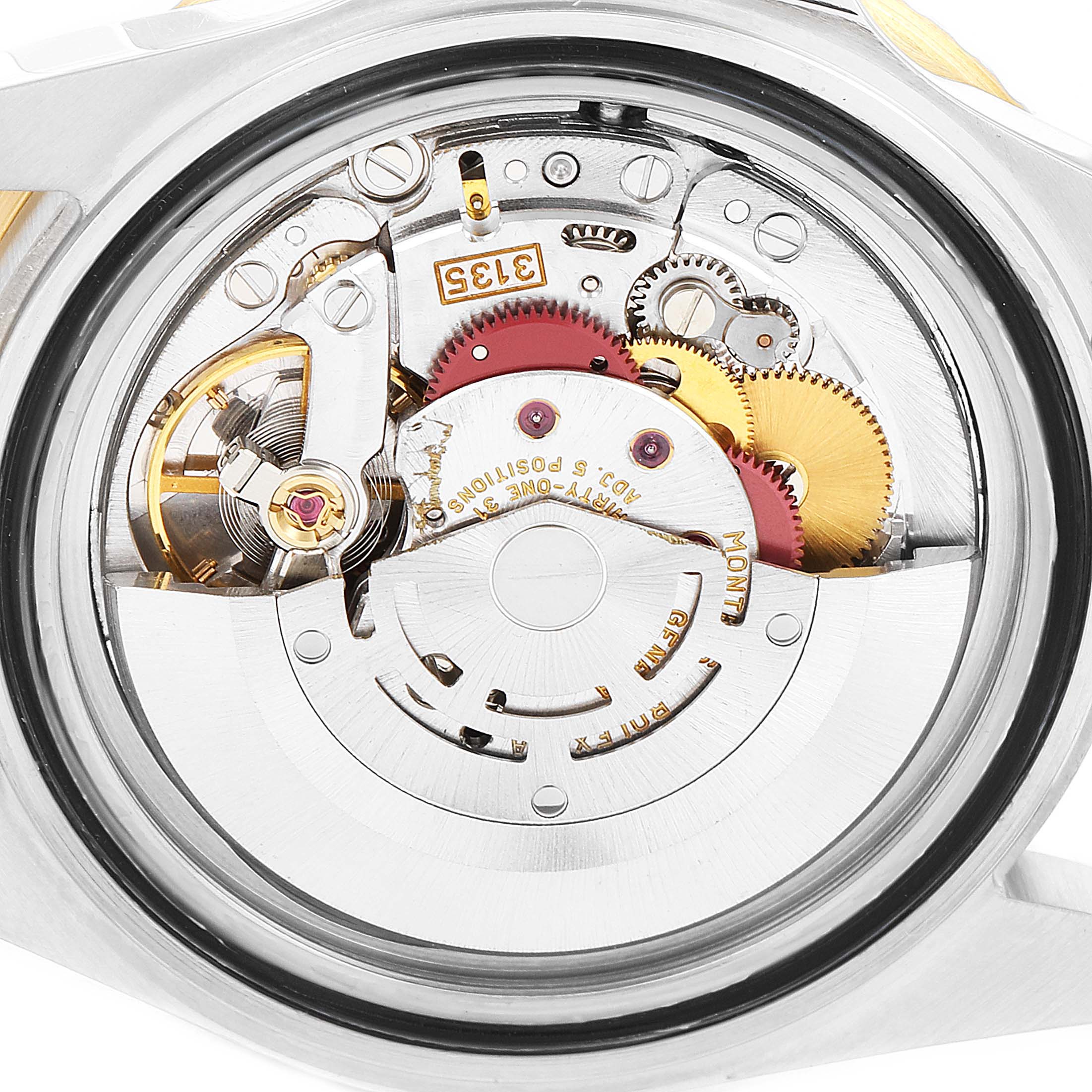 Close-up view of the movement mechanisms inside a Rolex Submariner 16613 Men's Steel and Gold (two tone) Black Dial 16613 Men's Steel and Gold (two tone) Black Dial watch, showcasing gears, rotor, and components.