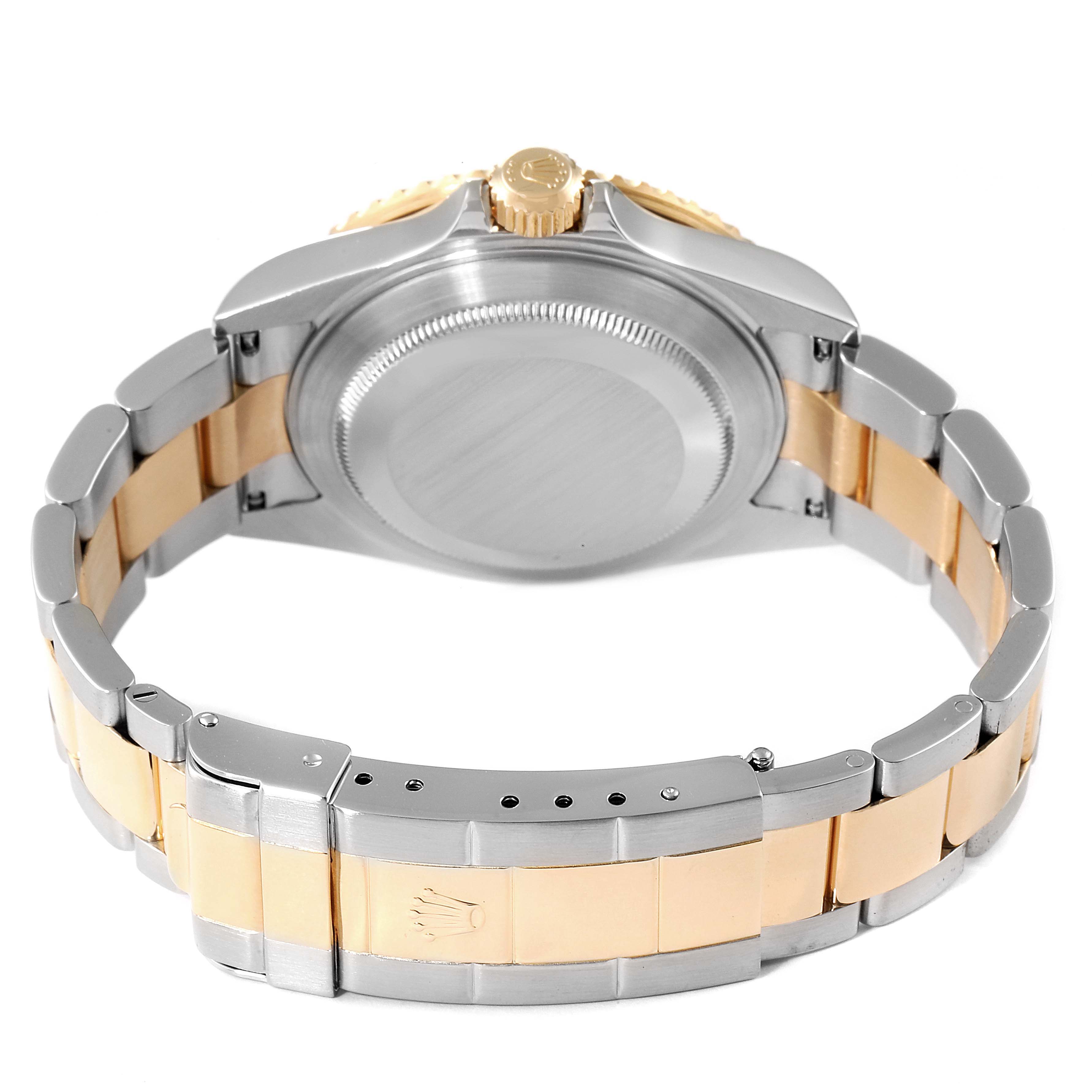 This image shows the back view of a Rolex Submariner 16613 Men's Steel and Gold (two tone) Black Dial 16613 Men's Steel and Gold (two tone) Black Dial watch, highlighting its case back and bracelet.