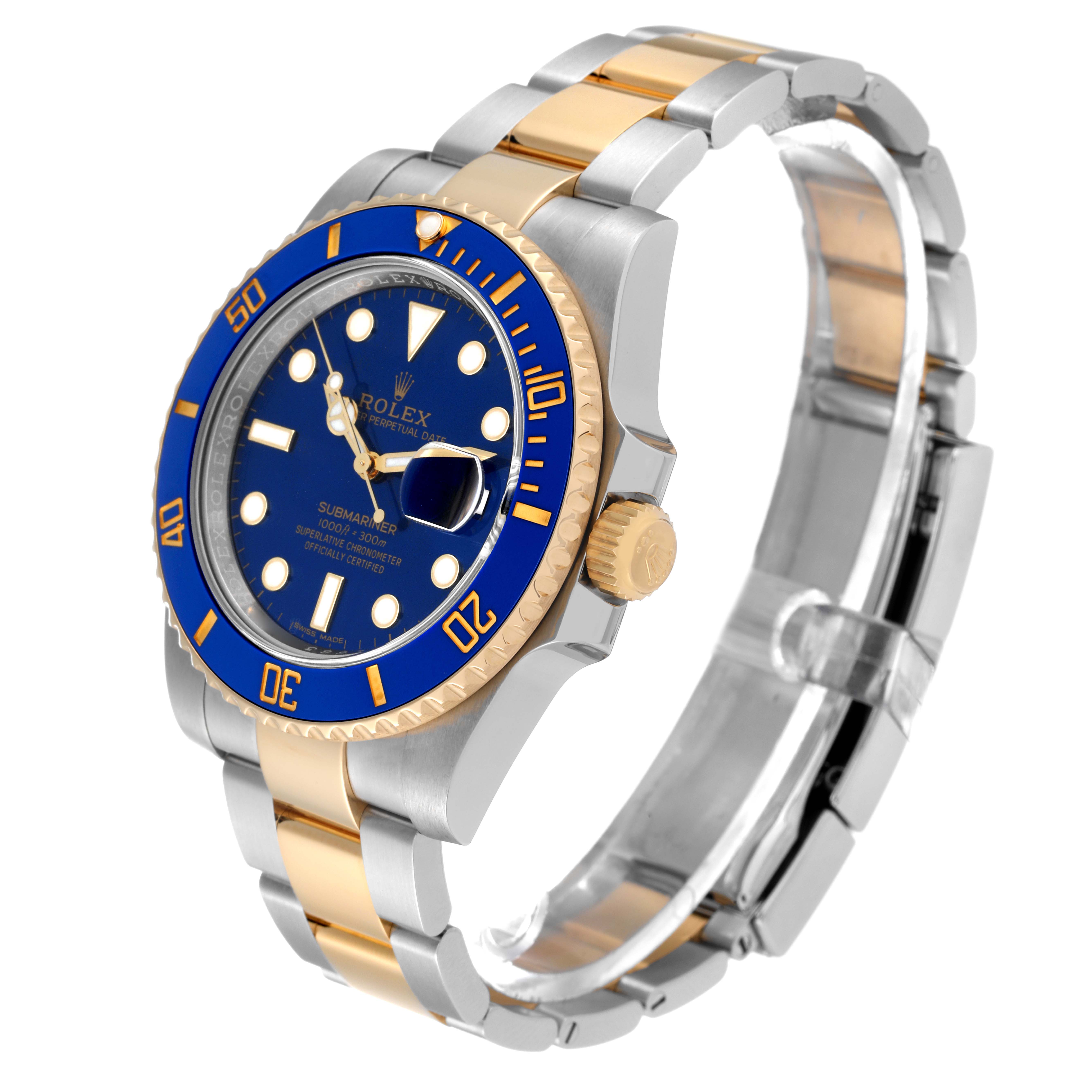 The image shows a Rolex Submariner 116613 Men's Steel and Gold (two tone) Blue Dial 116613 Men's Steel and Gold (two tone) Blue Dial watch at a three-quarter view, displaying its gold and silver bracelet, blue dial, and bezel.