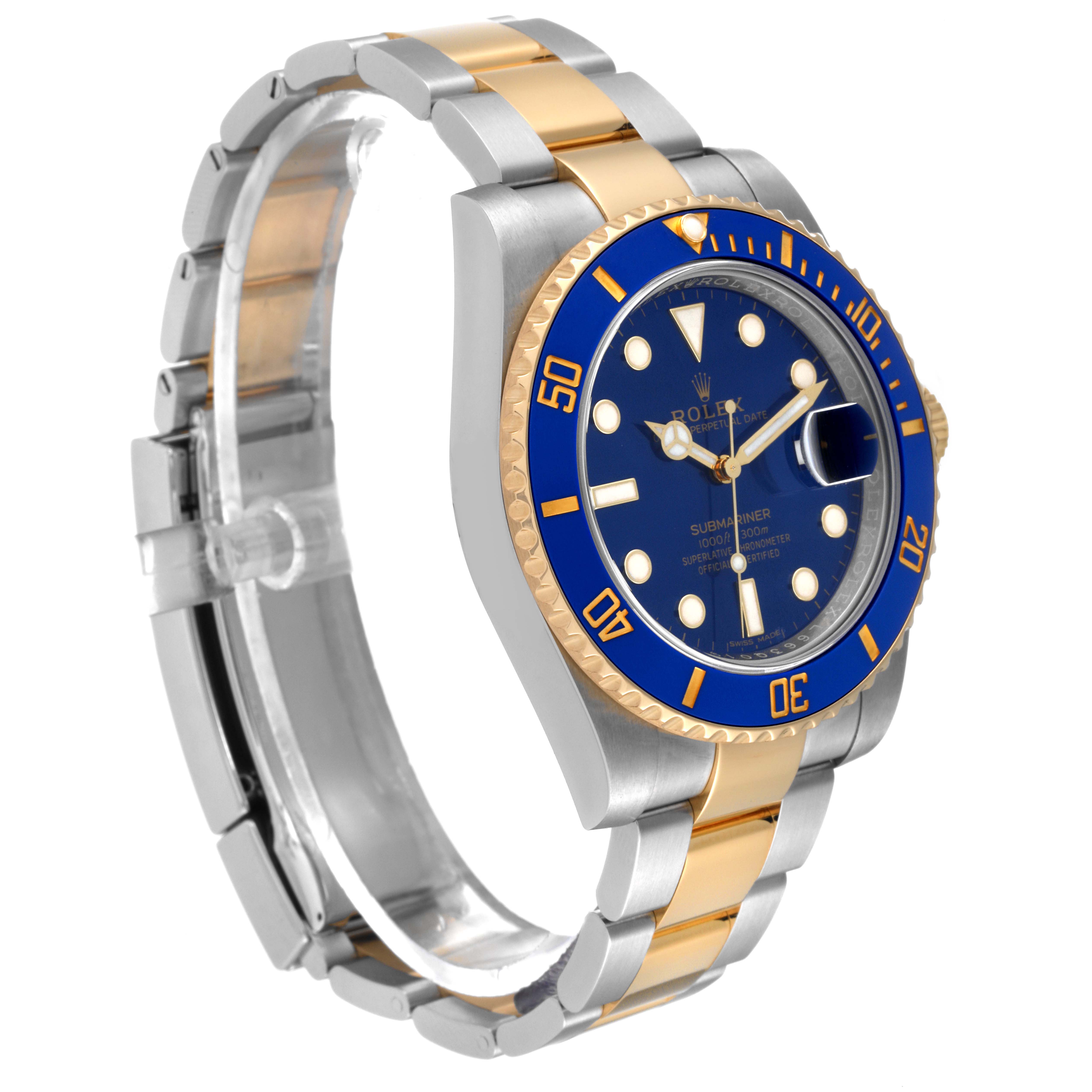 This image shows a side angle of a Rolex Submariner 116613 Men's Steel and Gold (two tone) Blue Dial 116613 Men's Steel and Gold (two tone) Blue Dial watch with a blue dial and bicolor (gold and silver) bracelet.