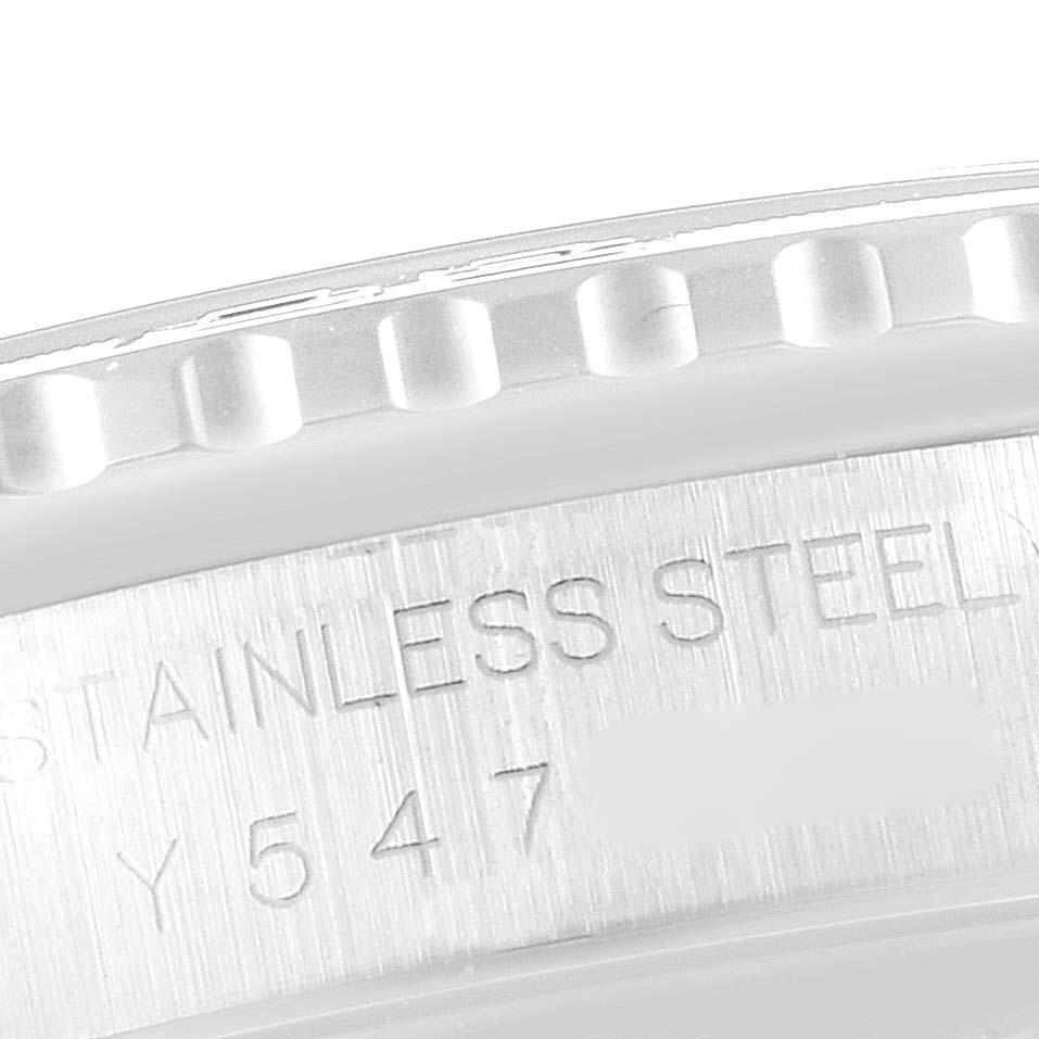This close-up image of a Rolex Turn-o-Graph 16264 Men
s Stainless Steel Silver Dial 16264 Men
s Stainless Steel Silver Dial watch showcases the bezel and part of the case, highlighting the stainless steel inscription.