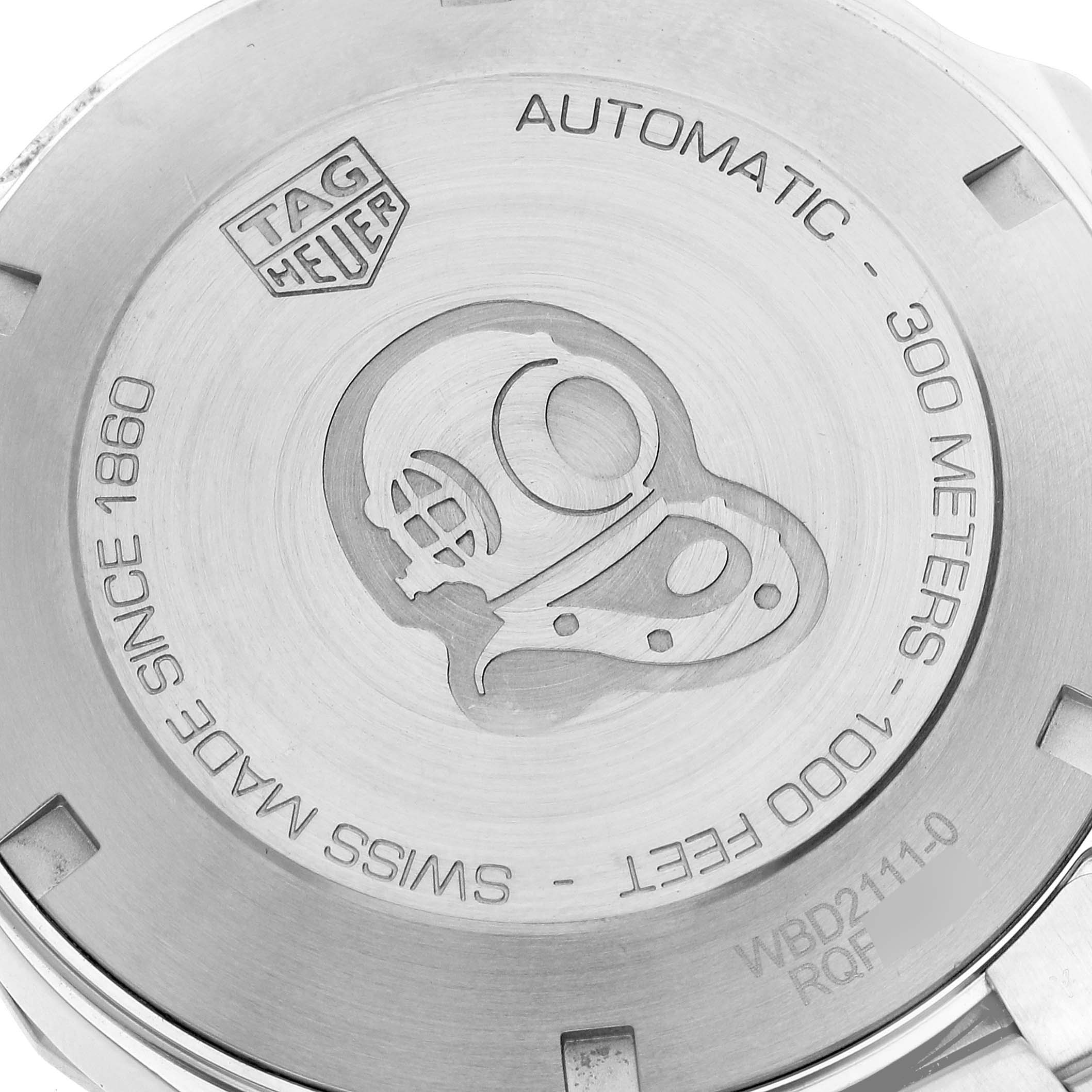 This image shows the case back of the Tag Heuer Aquaracer WBD2111.BA0928 Men's Stainless Steel White Dial WBD2111.BA0928 Men's Stainless Steel White Dial watch, highlighting its engravings and specifications.