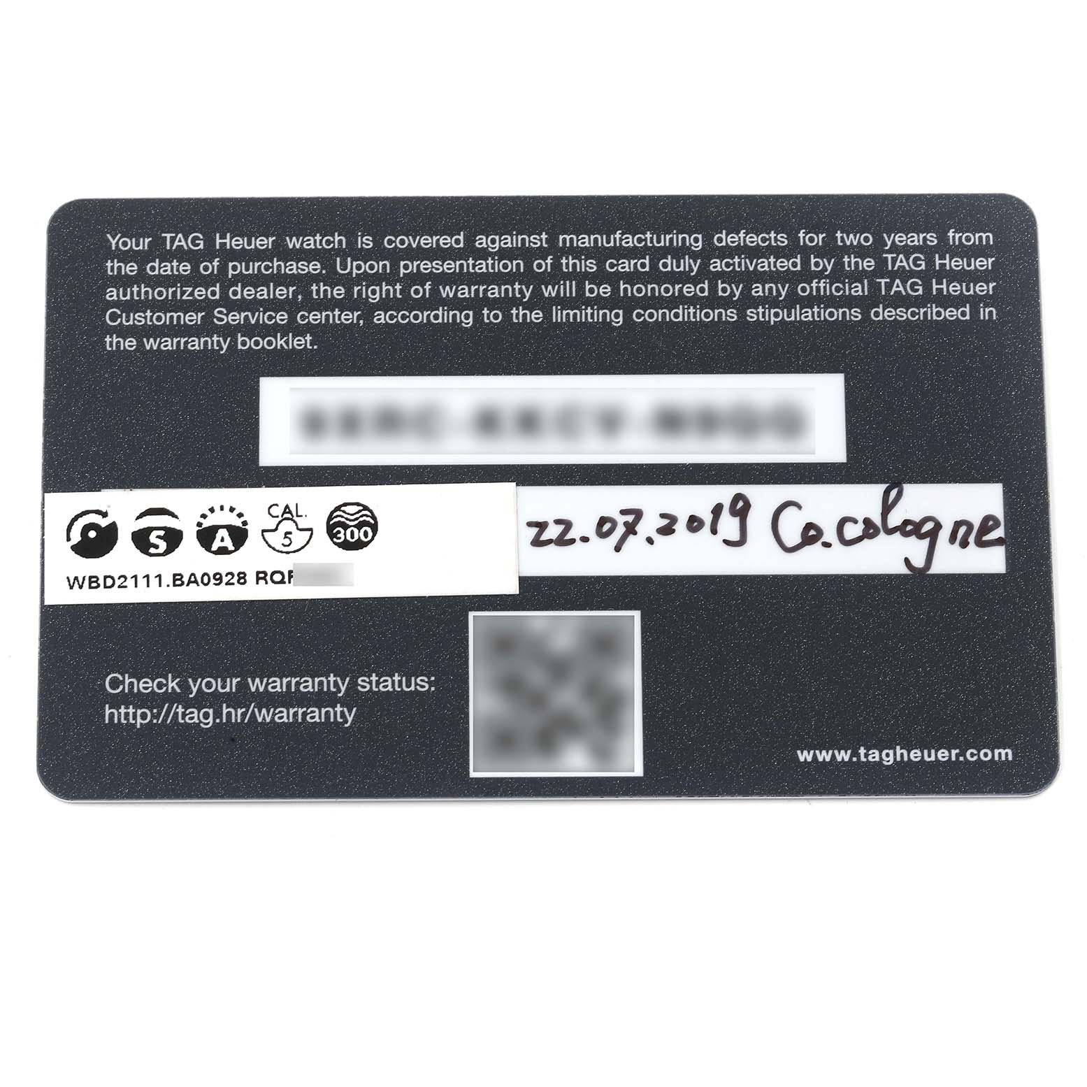 The image shows a warranty card for a Tag Heuer Aquaracer WBD2111.BA0928 Men's Stainless Steel White Dial WBD2111.BA0928 Men's Stainless Steel White Dial model, detailing the purchase date and other warranty information.