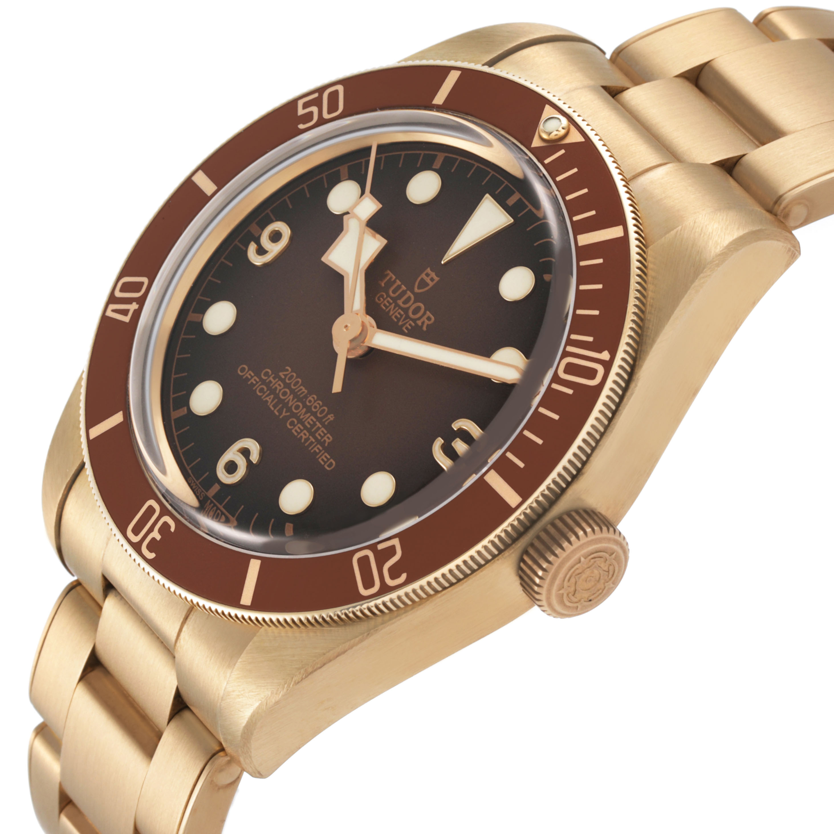 The Tudor Heritage Black Bay M79012M-0001 Men's Bronze Brown Dial watch is shown from an angle displaying the face, bezel, crown, and part of the bracelet.