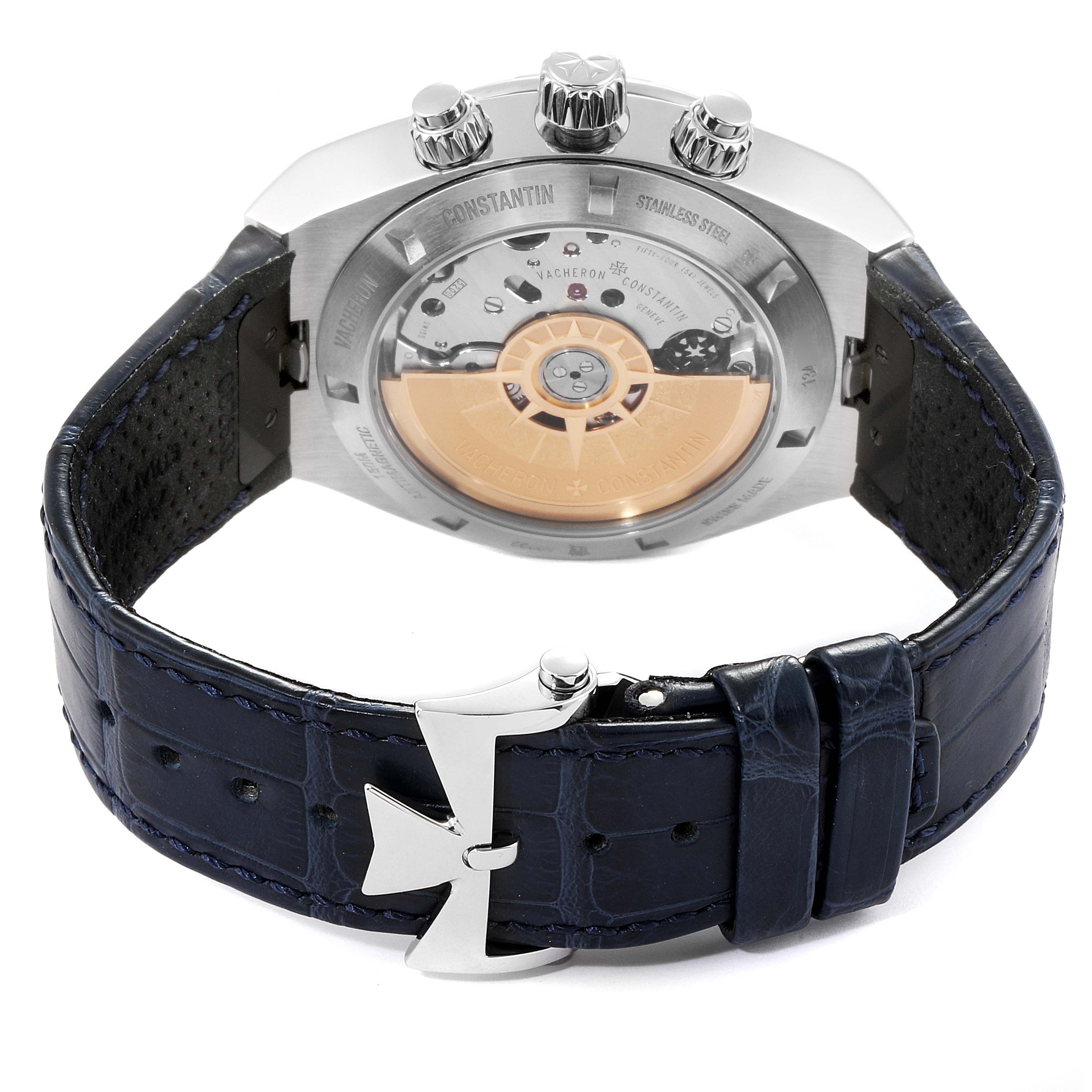 The image shows the back view of a Vacheron Constantin Overseas 5500V/110A-B148 Men's Stainless Steel Blue Dial 5500V/110A-B148 Men's Stainless Steel Blue Dial watch, displaying its movement and a blue leather strap with the clasp.