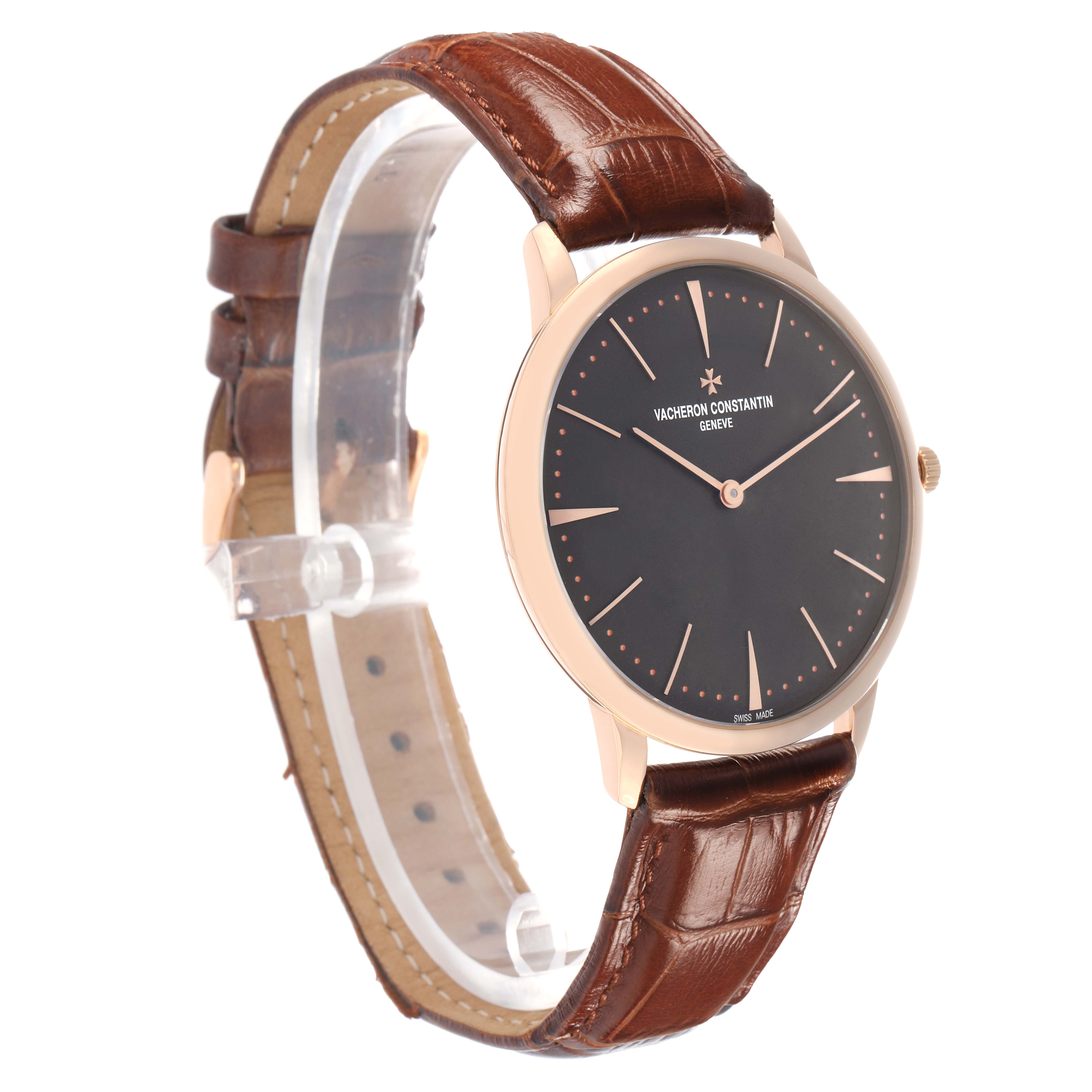 The Vacheron Constantin Patrimony 81180 Men
s Rose Gold Grey Dial watch is shown at a three-quarter angle, highlighting the face, case, and brown leather strap.