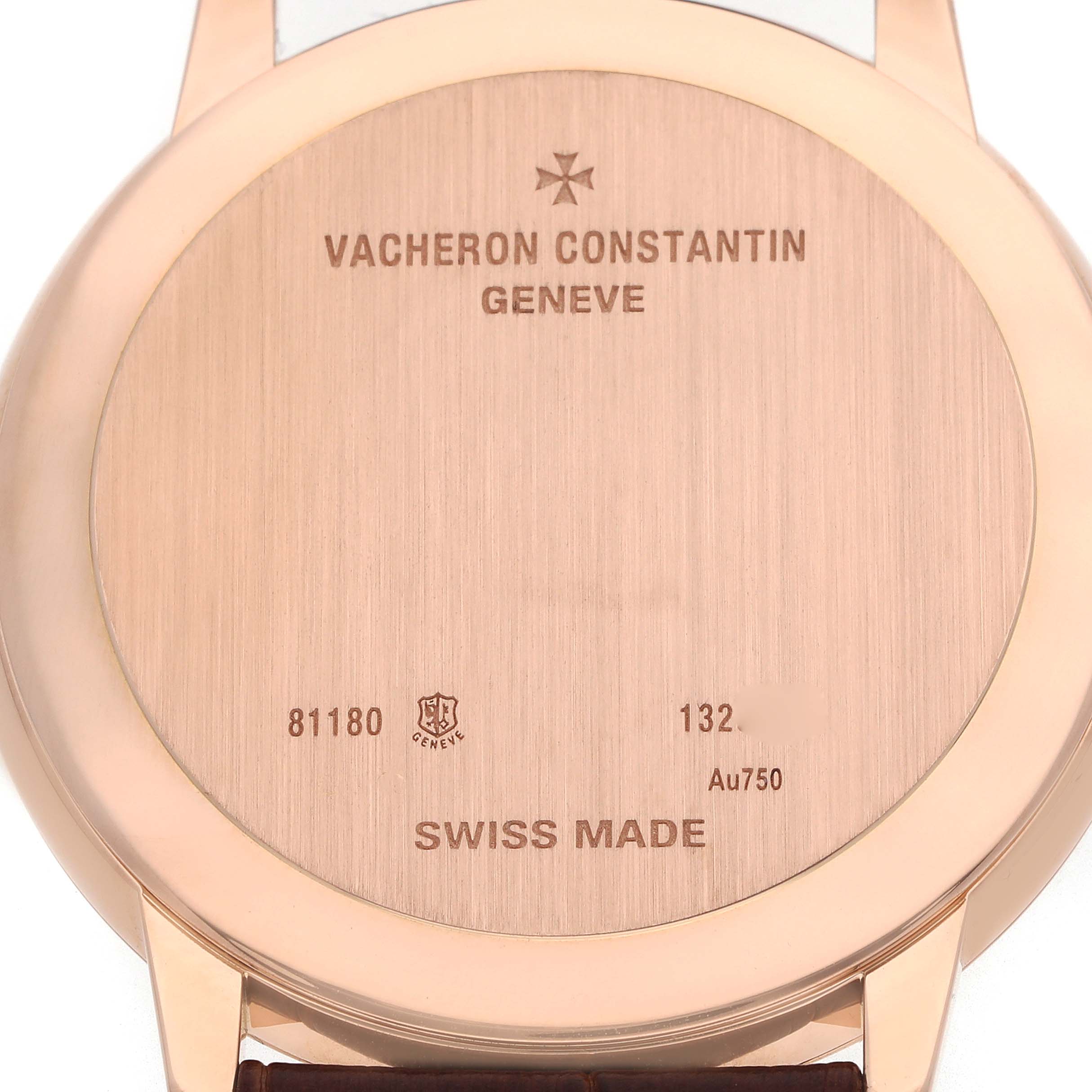 The image shows the case back of a Vacheron Constantin Patrimony 81180 Men
s Rose Gold Grey Dial watch, displaying inscriptions and the lugs.