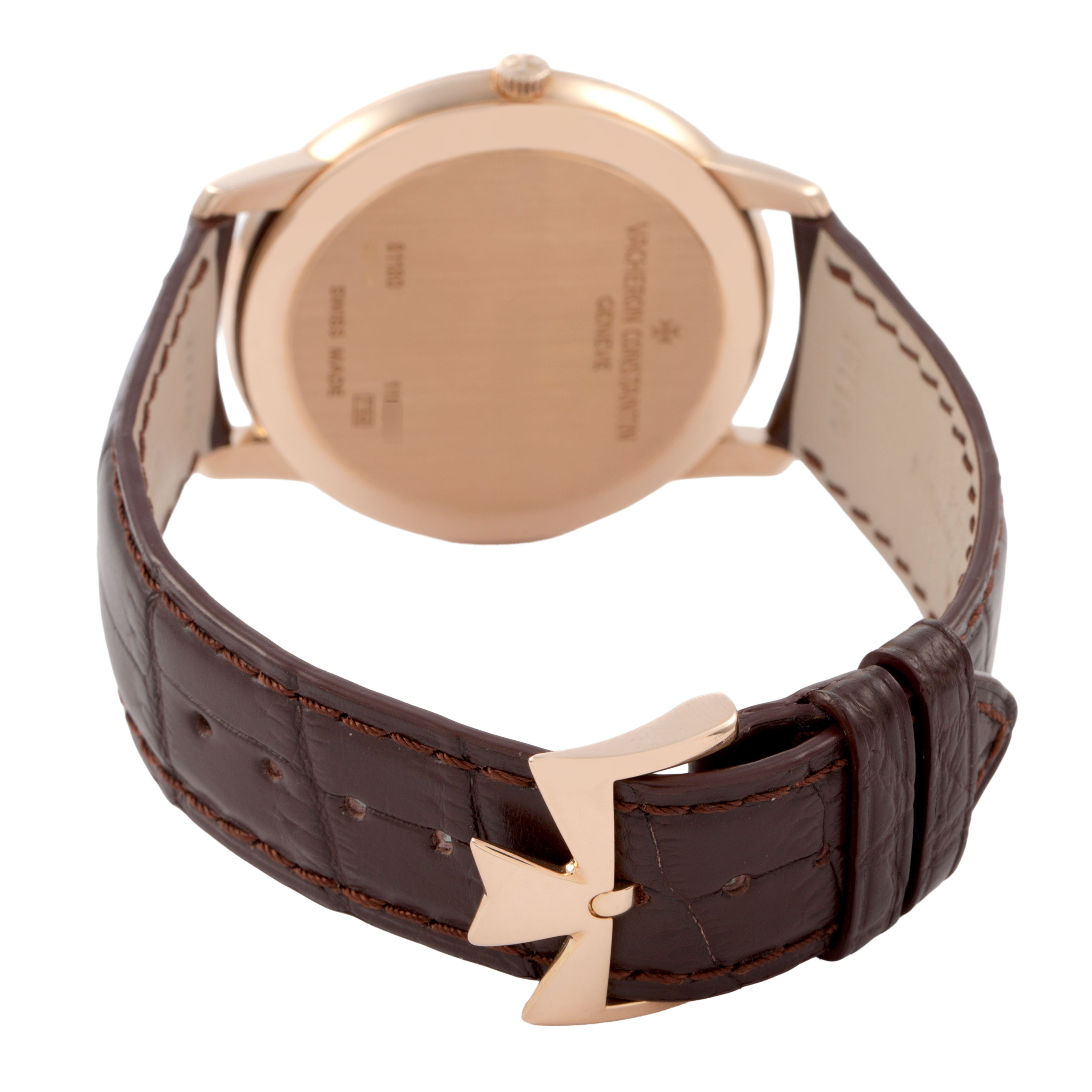 The image shows the back and side view of a Vacheron Constantin Patrimony 81180/000R-9159 Men's Rose Gold Silver Dial watch, highlighting its case back and leather strap with clasp.