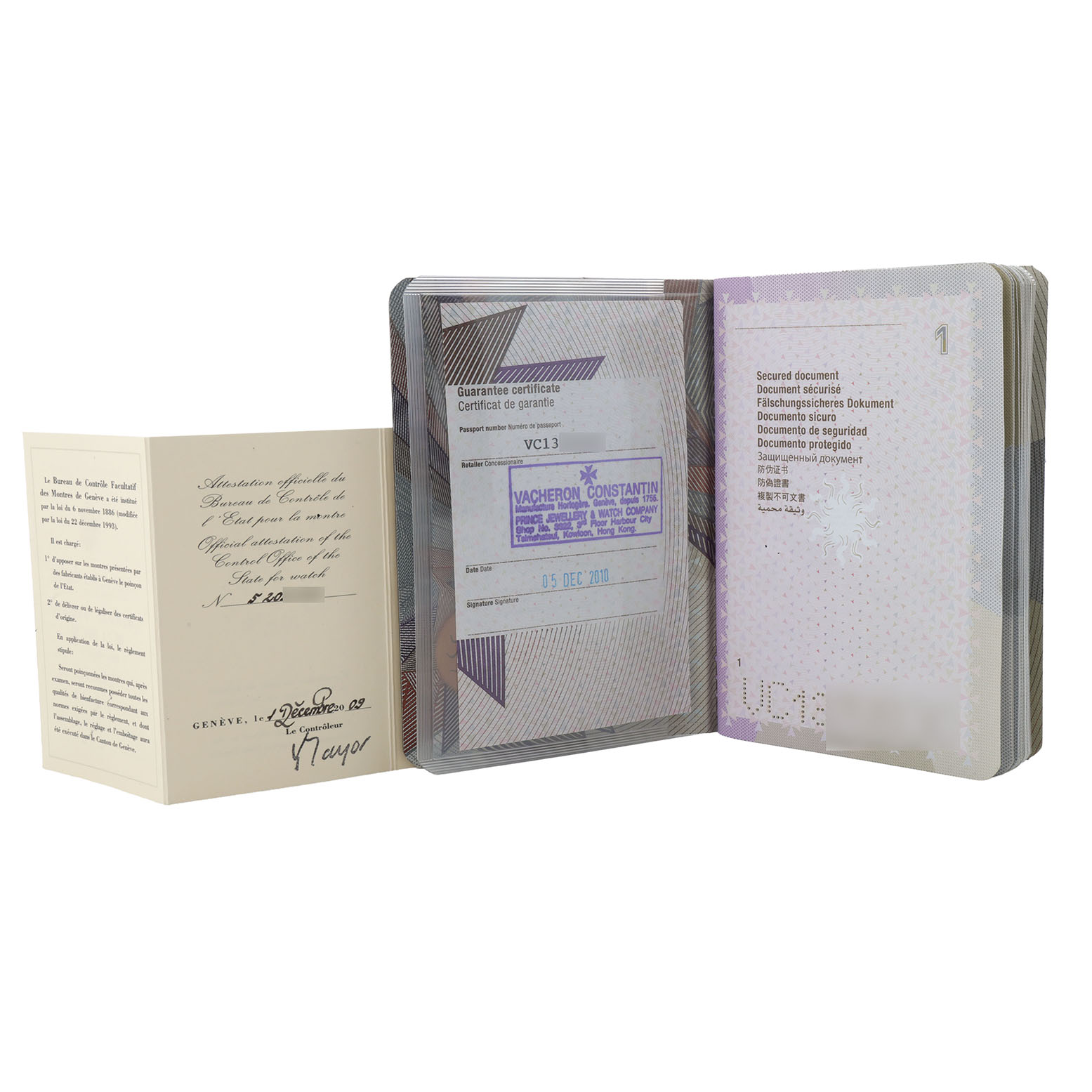 This image shows warranty and documentation booklets for a Vacheron Constantin Patrimony 81180/000R-9159 Men's Rose Gold Silver Dial watch, displayed at a slight angle.