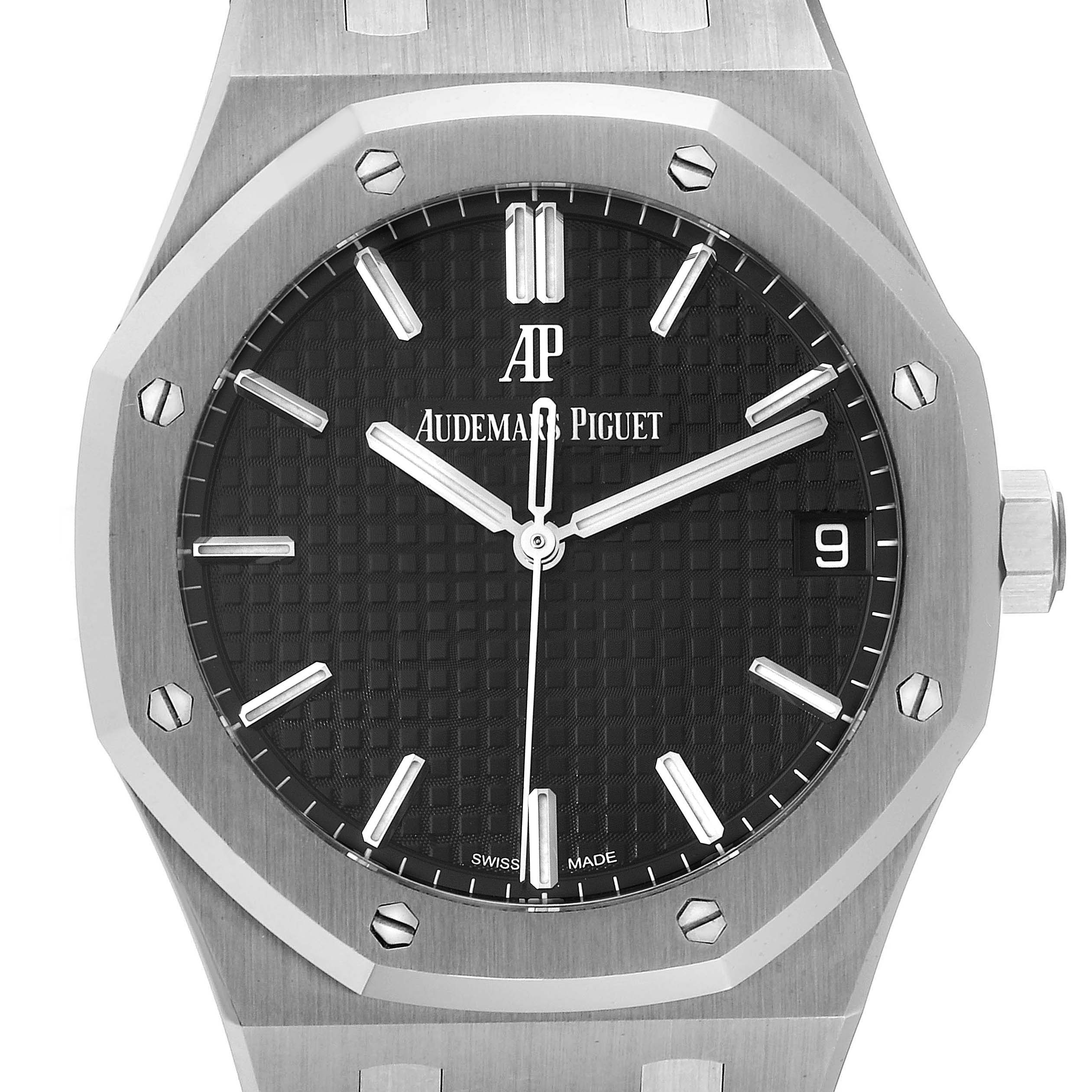 The image shows a close-up of the dial and bezel of the Royal Oak model by Audemars Piguet.