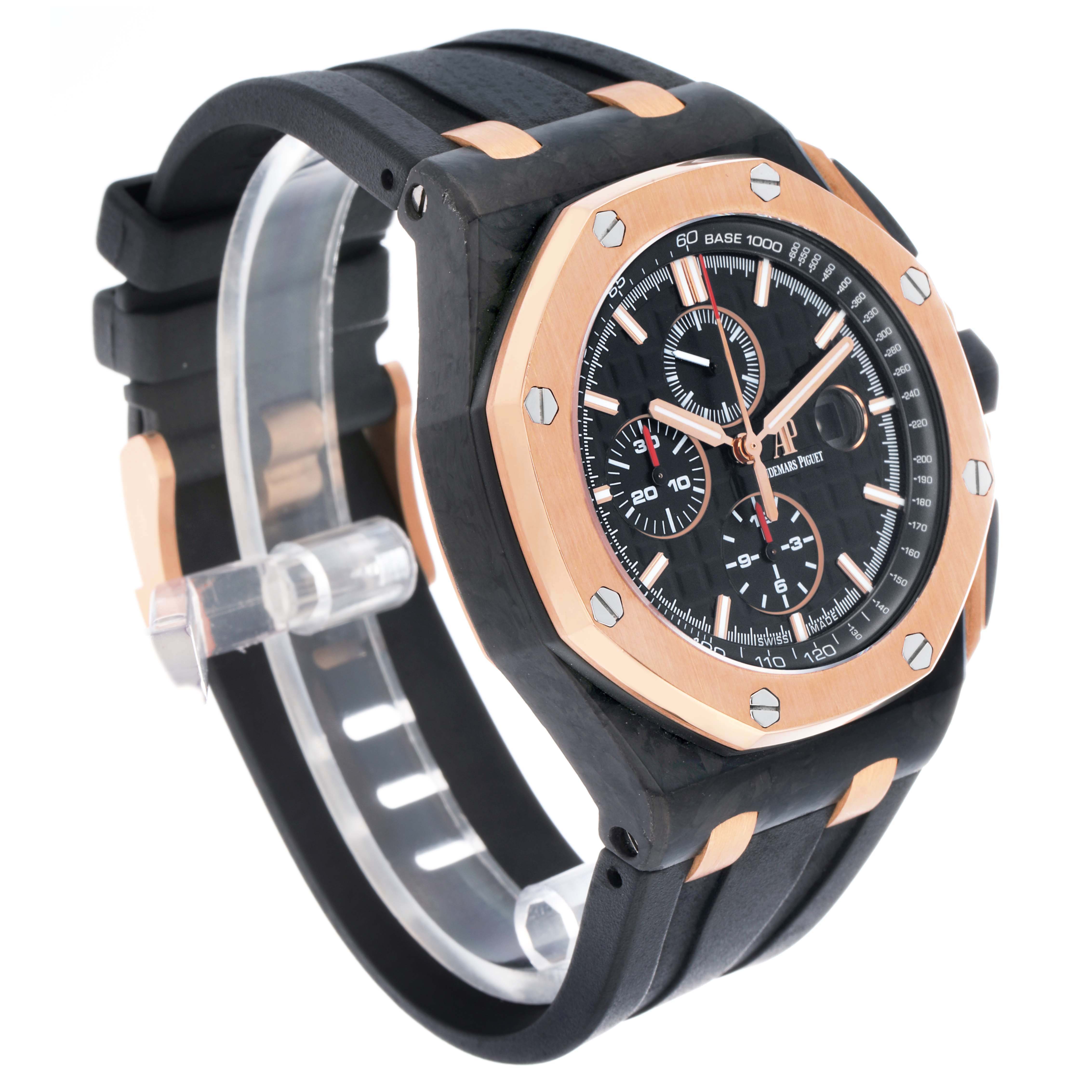 The Audemars Piguet Royal Oak Offshore 26406FR Men's Rose Gold Black Dial watch is shown at a three-quarter angle, highlighting its dial, bezel, and strap.