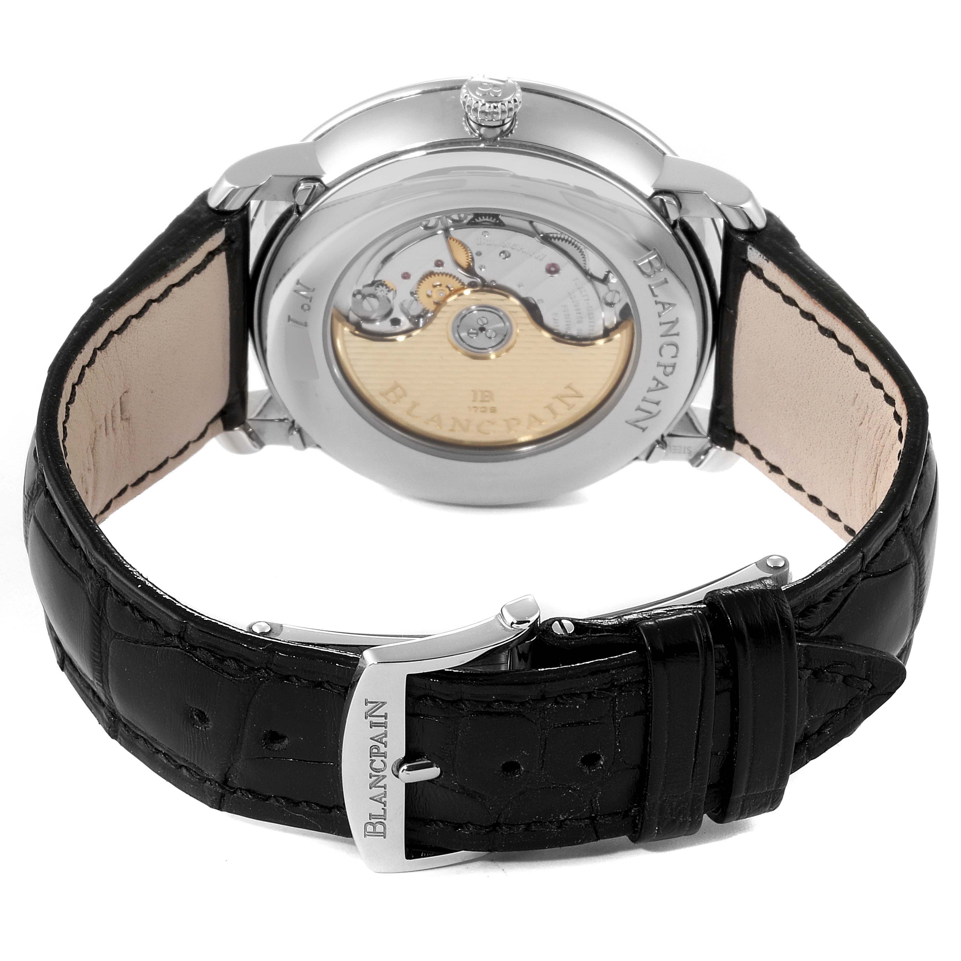 This image shows the back of the Blancpain Villeret 6654-1127-55B Men's Stainless Steel Silver Dial 6654-1127-55B Men's Stainless Steel Silver Dial watch, revealing its movement and black leather strap with a Blancpain buckle.
