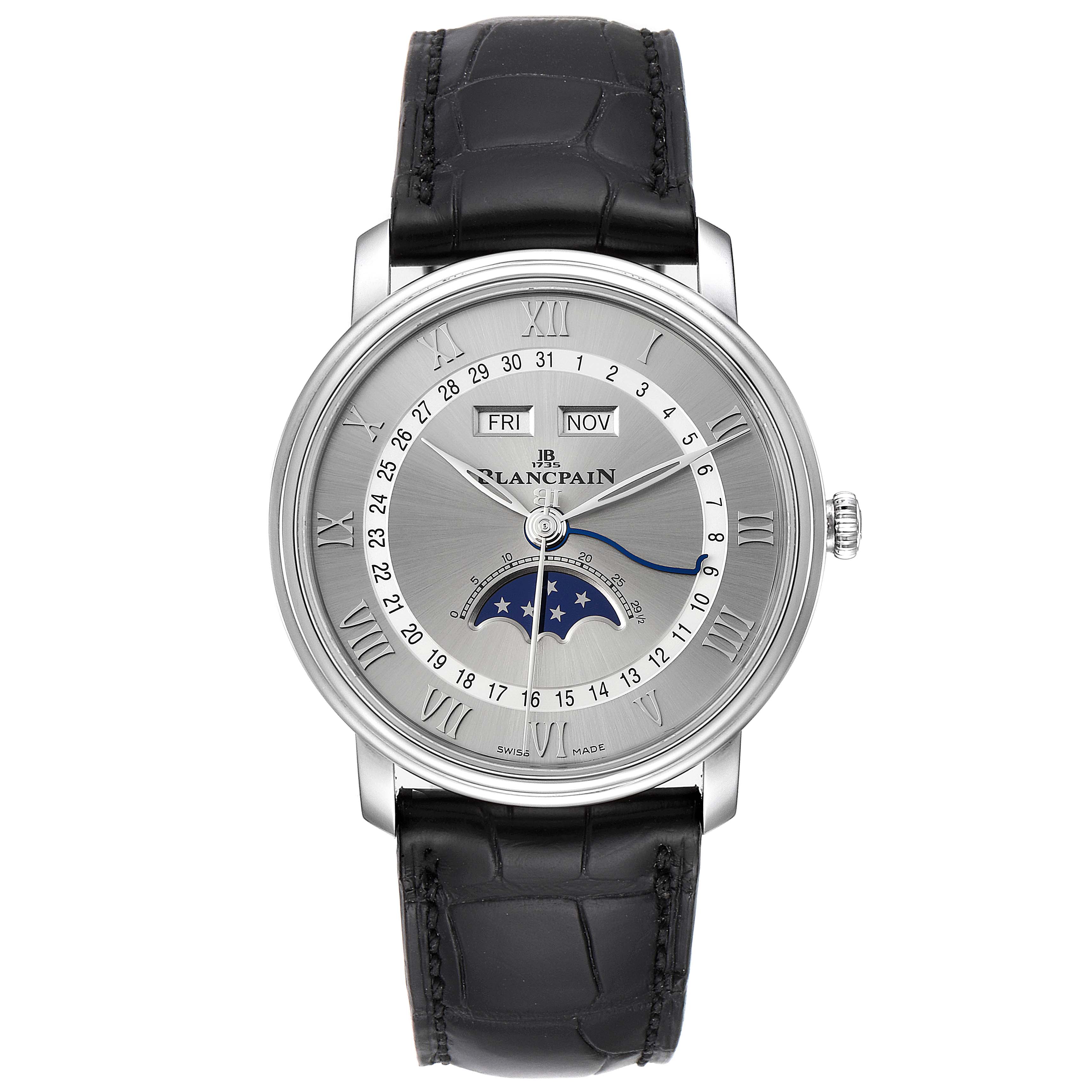 The Blancpain Villeret 6654-1127-55B Men's Stainless Steel Silver Dial 6654-1127-55B Men's Stainless Steel Silver Dial watch is shown from a top-down angle, displaying the dial, moonphase, and part of the black leather strap.