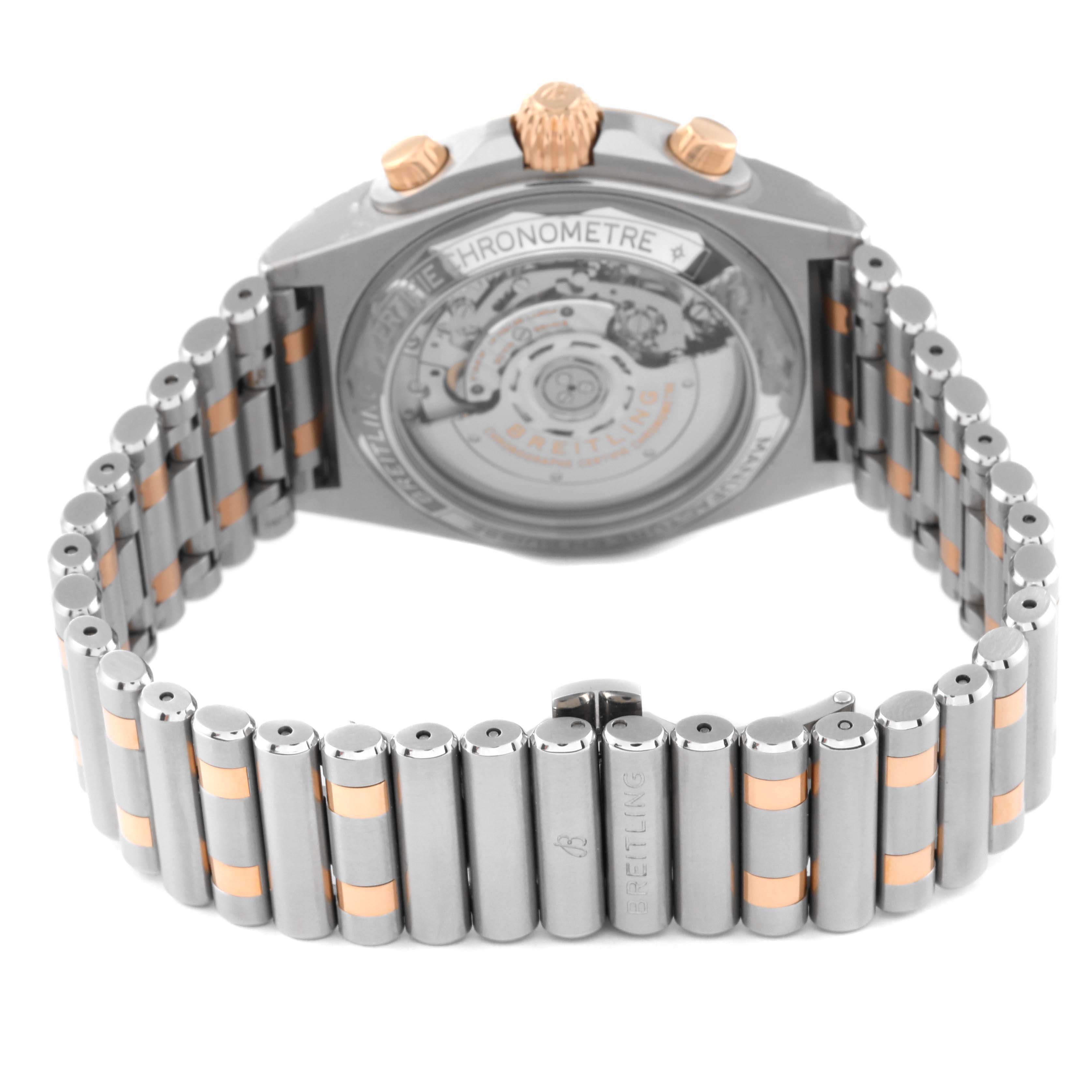 This image shows the back view of the Breitling Chronomat UB0134 Men's Steel and Gold (two tone) Grey Dial UB0134 Men's Steel and Gold (two tone) Grey Dial watch, focusing on the case back and metal bracelet.