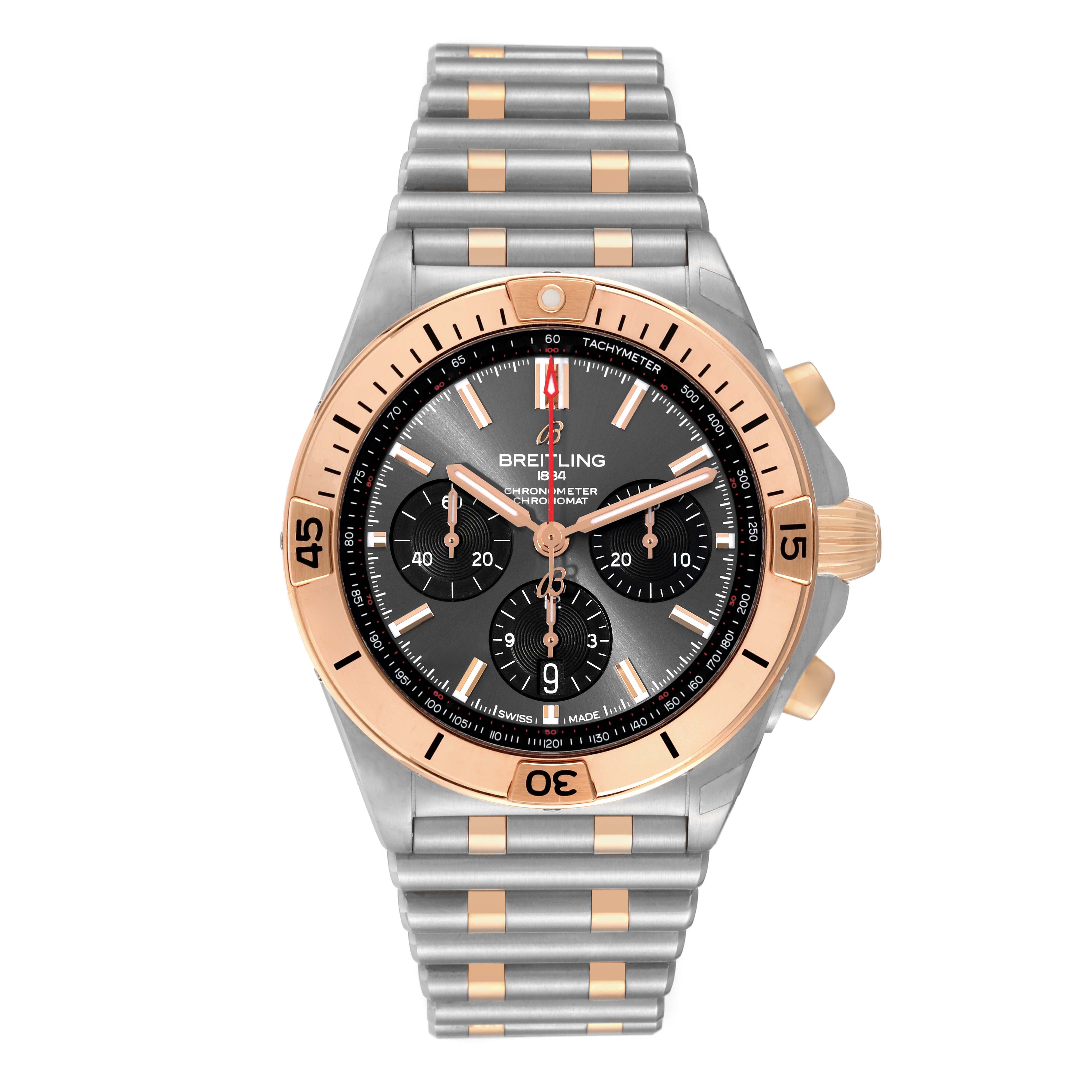The image shows a front view of a Breitling Chronomat UB0134 Men's Steel and Gold (two tone) Grey Dial UB0134 Men's Steel and Gold (two tone) Grey Dial watch featuring a two-tone bracelet and dial with chronograph subdials.