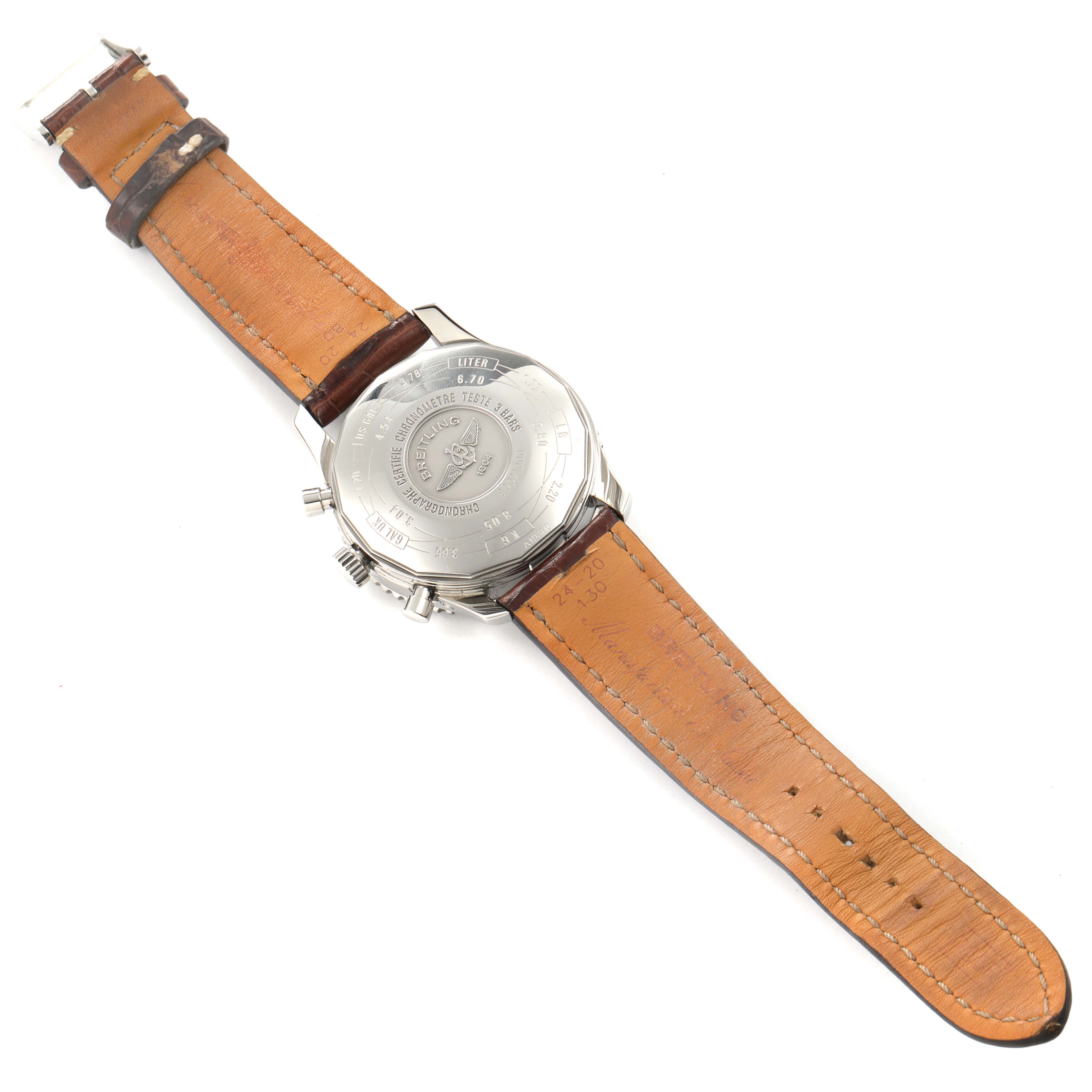 The image displays the back side of a Breitling Navitimer A19370 Men's Stainless Steel Black Dial A19370 Men's Stainless Steel Black Dial watch, showing its case back and leather strap.