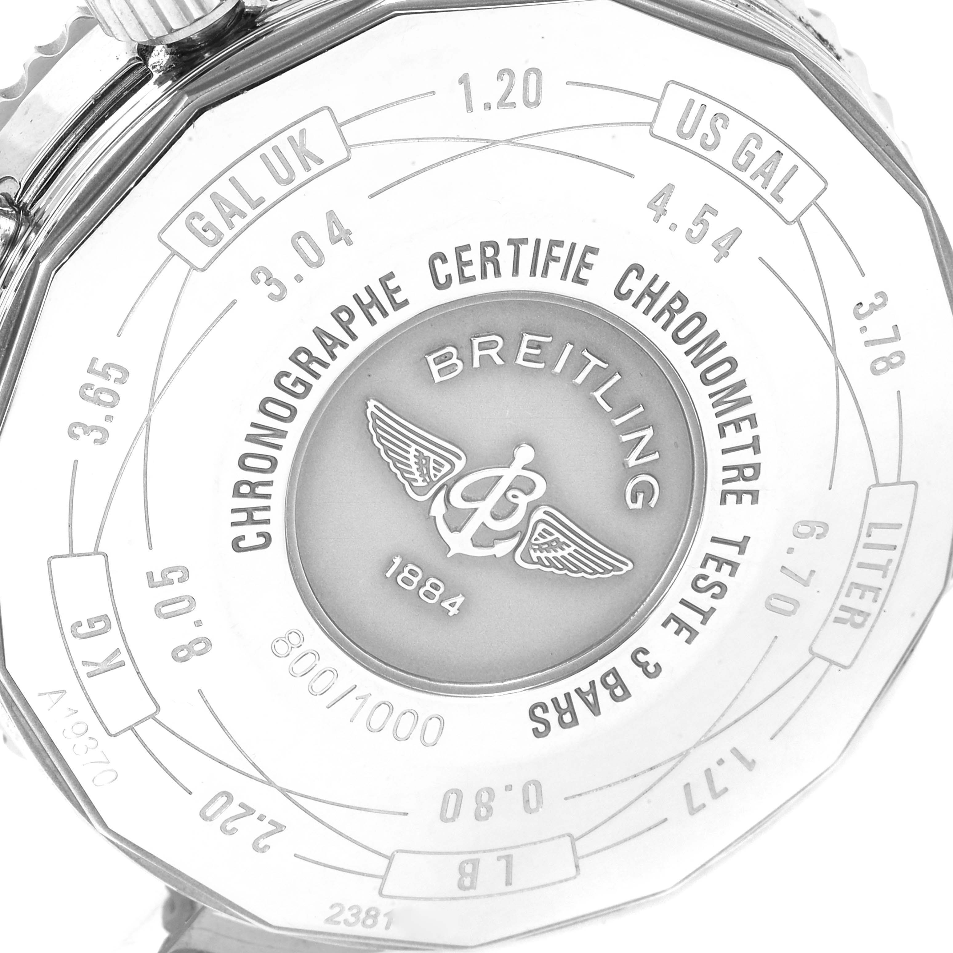 The image shows the back case of a Breitling Navitimer A19370 Men's Stainless Steel Black Dial A19370 Men's Stainless Steel Black Dial watch, displaying conversion scales, branding, and certification details.