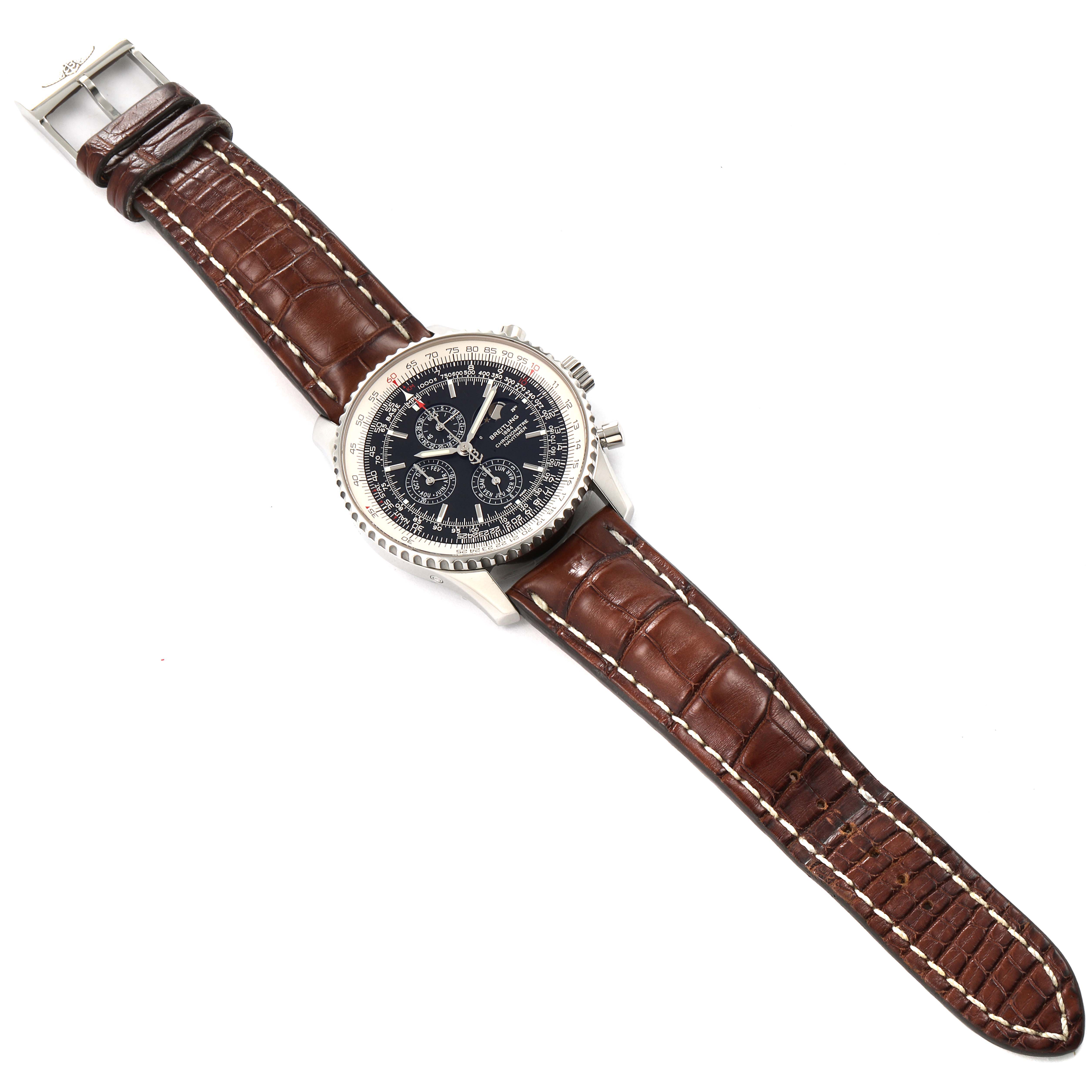 The image shows a top-down view of a Breitling Navitimer A19370 Men's Stainless Steel Black Dial A19370 Men's Stainless Steel Black Dial watch with a brown leather strap and a black dial.