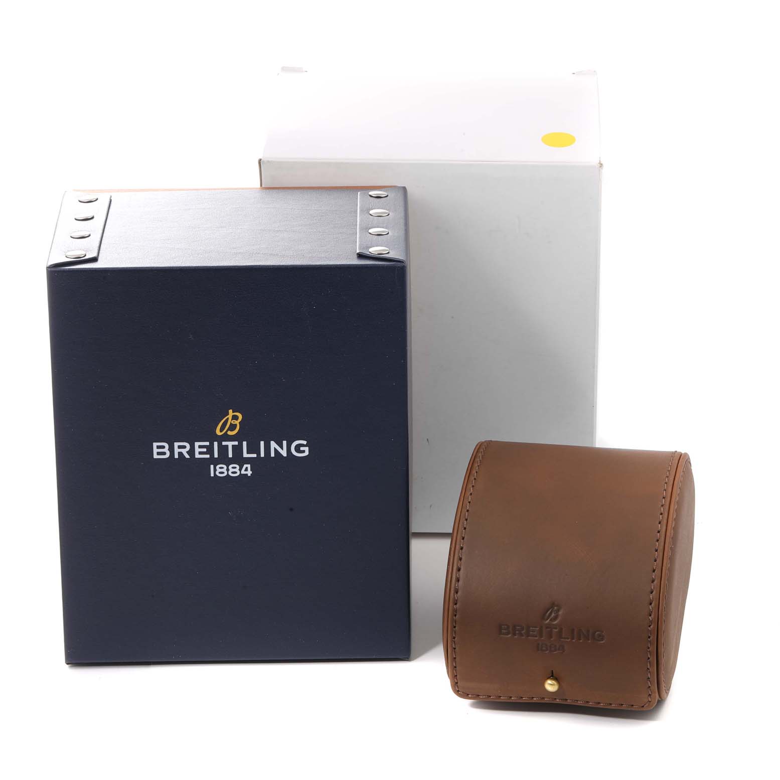 The image shows a Breitling branded box and a leather case accessory for the Navitimer model, along with an outer white box.