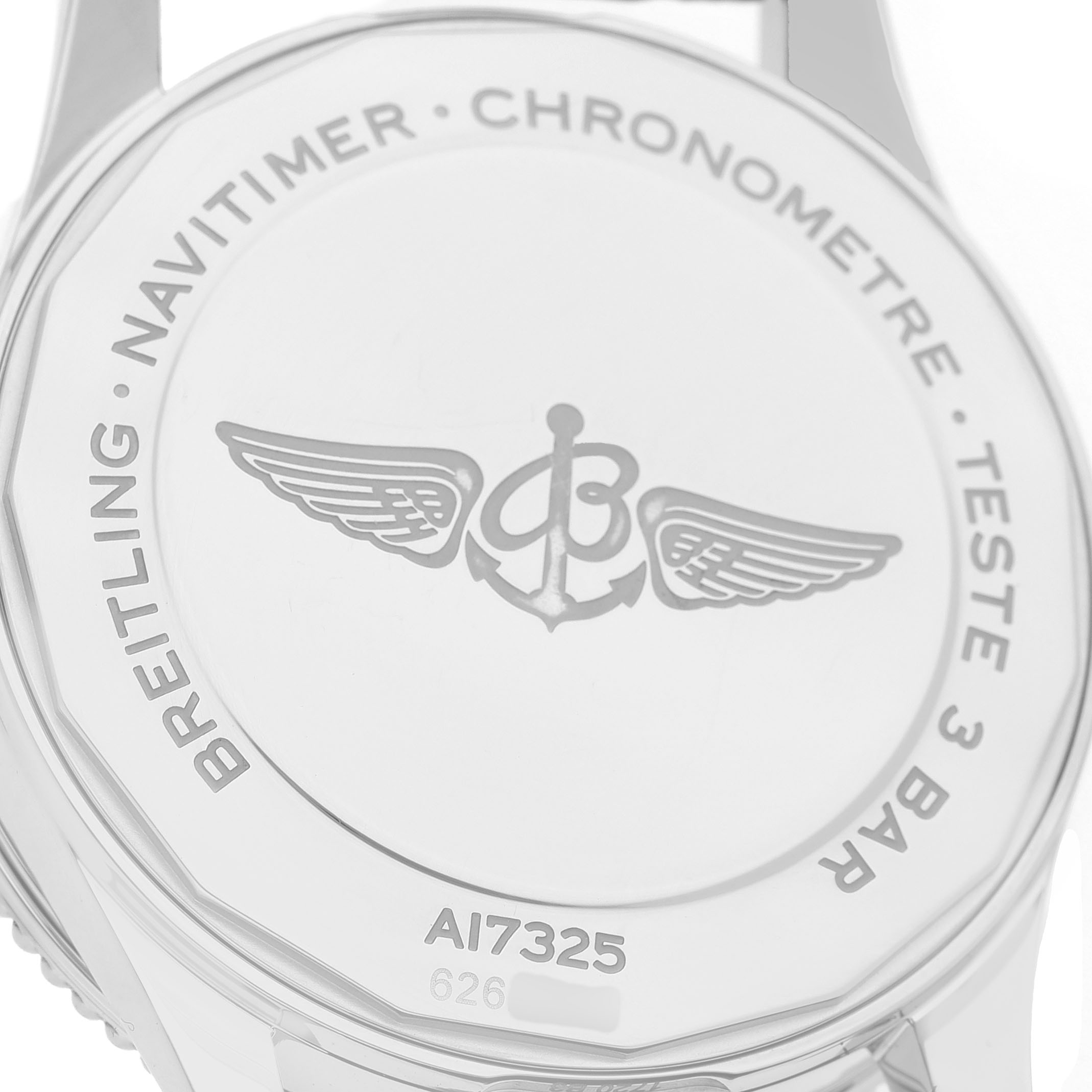 The image shows the back of a Breitling Navitimer A17325 Men's Stainless Steel Blue Dial watch with engravings and logo.