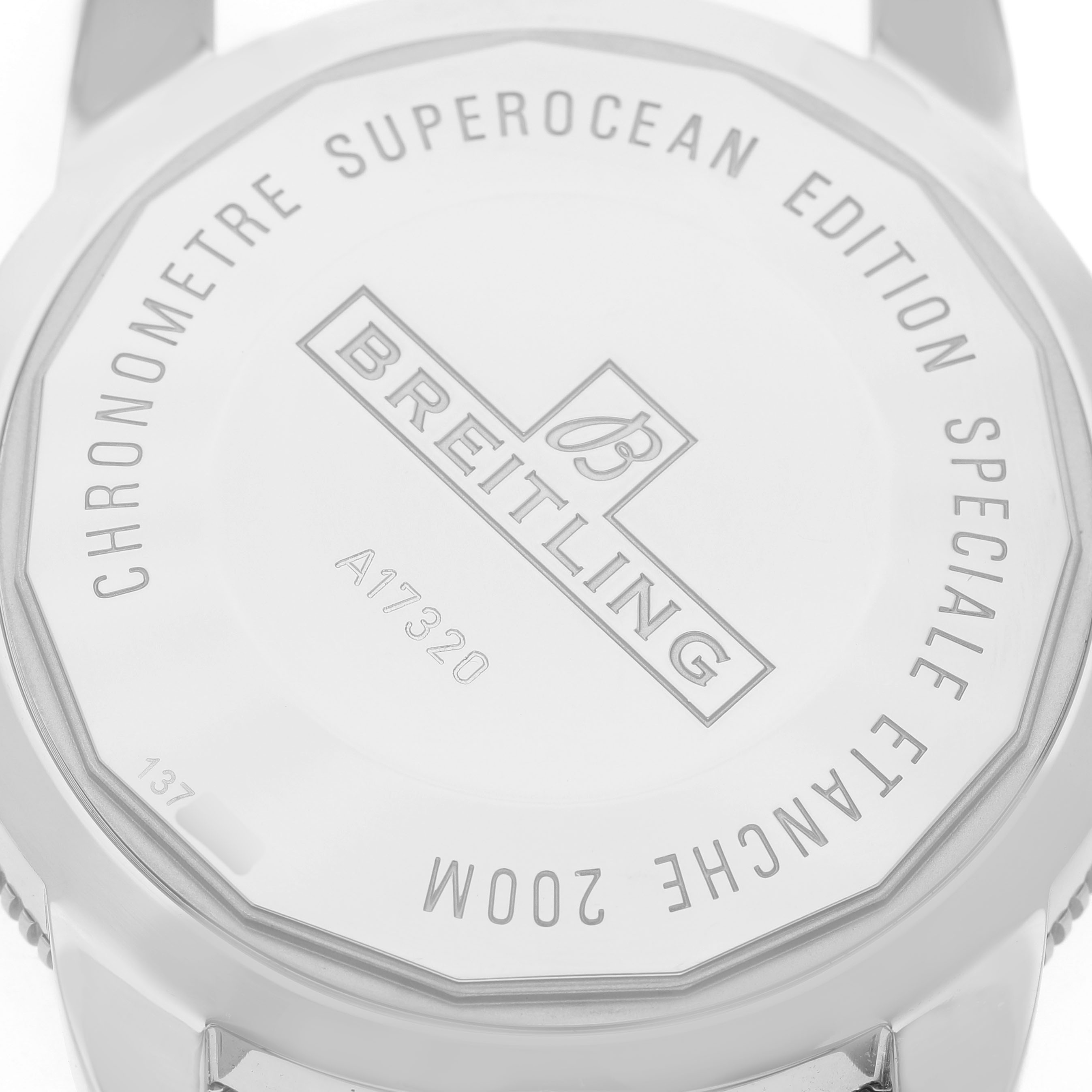 The image shows the case back of the Breitling Superocean A17320 Men's Stainless Steel Blue Dial watch, displaying branding and model details.