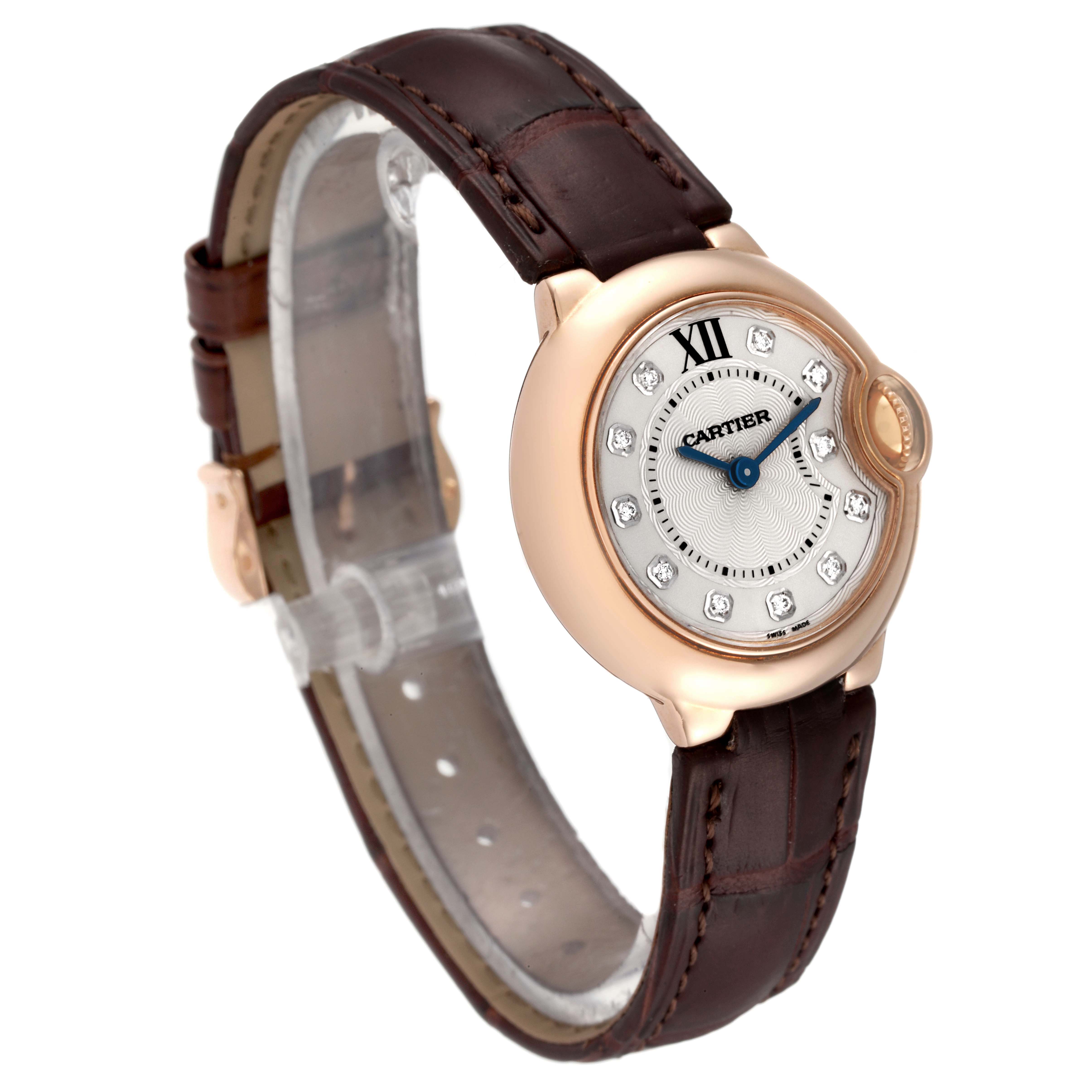The image shows a side angle of the Cartier Ballon Bleu WE902050 Women's Rose Gold Silver Dial WE902050 Women's Rose Gold Silver Dial watch, highlighting its face, strap, and crown.