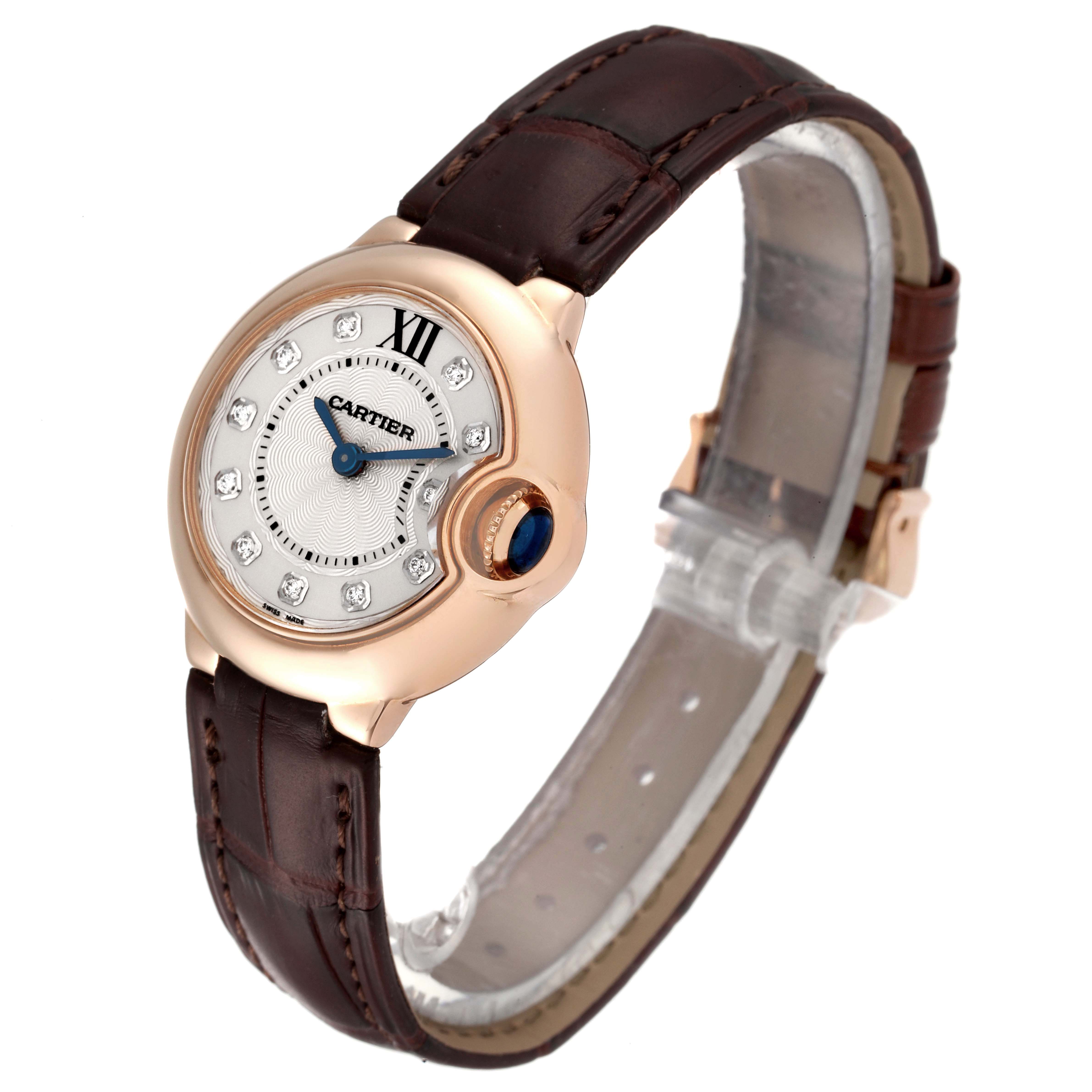 The image shows a Cartier Ballon Bleu WE902050 Women's Rose Gold Silver Dial WE902050 Women's Rose Gold Silver Dial watch angled from the front-left, highlighting its face, case, and brown leather strap.