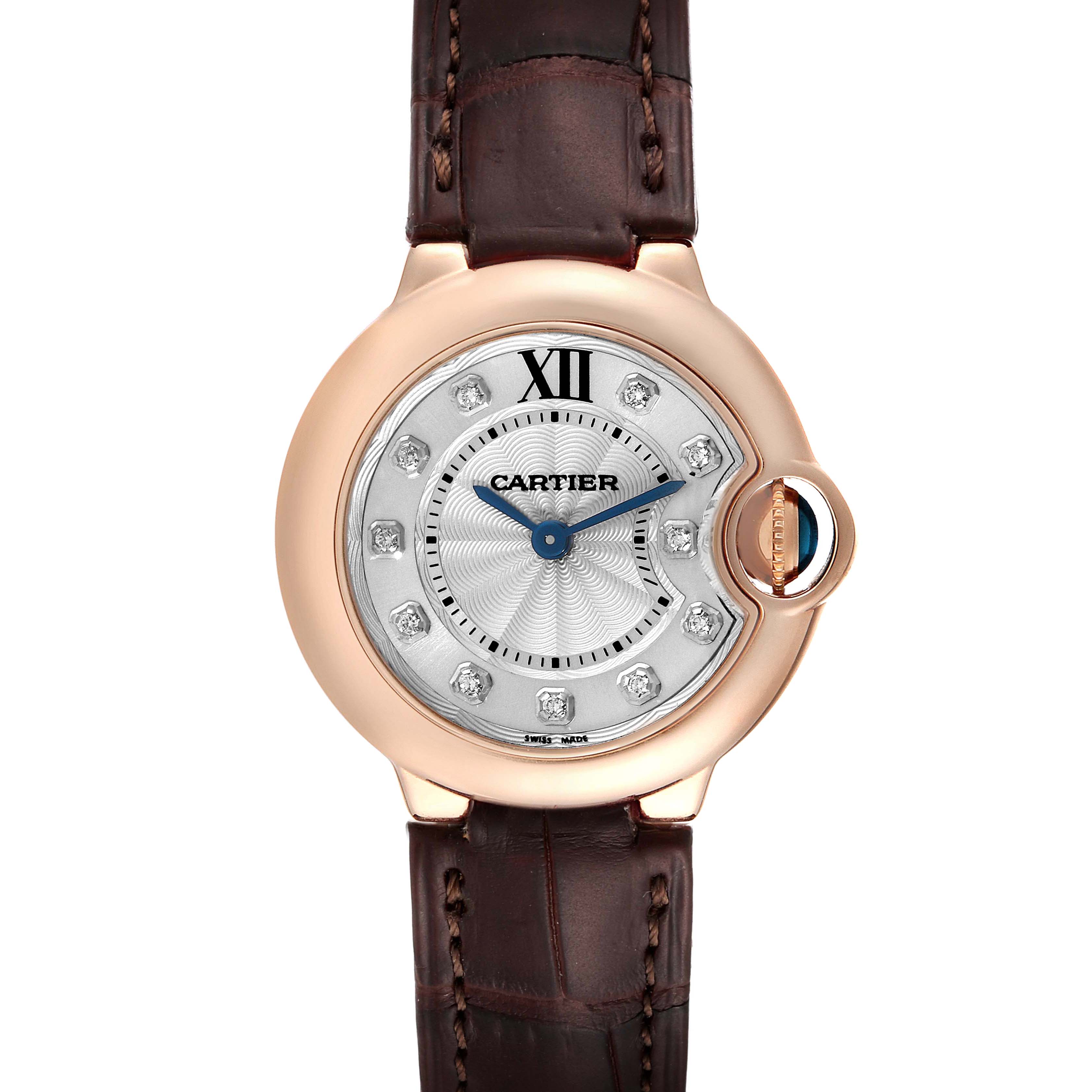 This is a front view of the Cartier Ballon Bleu WE902050 Women's Rose Gold Silver Dial WE902050 Women's Rose Gold Silver Dial showing the watch face, bezel, and part of the brown leather strap.