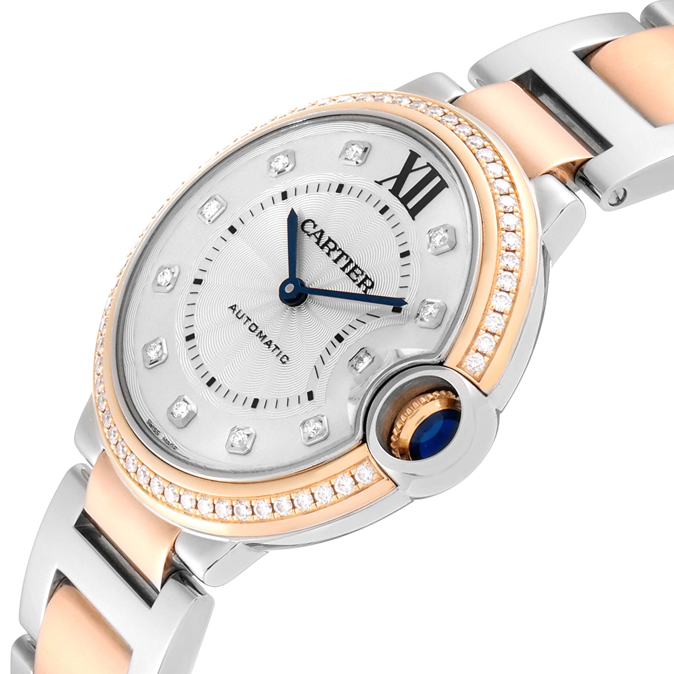 This image shows a close-up side angle of a Cartier Ballon Bleu WE902078 Women's Rose Gold Silver Dial WE902078 Women's Rose Gold Silver Dial watch featuring its face, crown, and part of the bracelet.