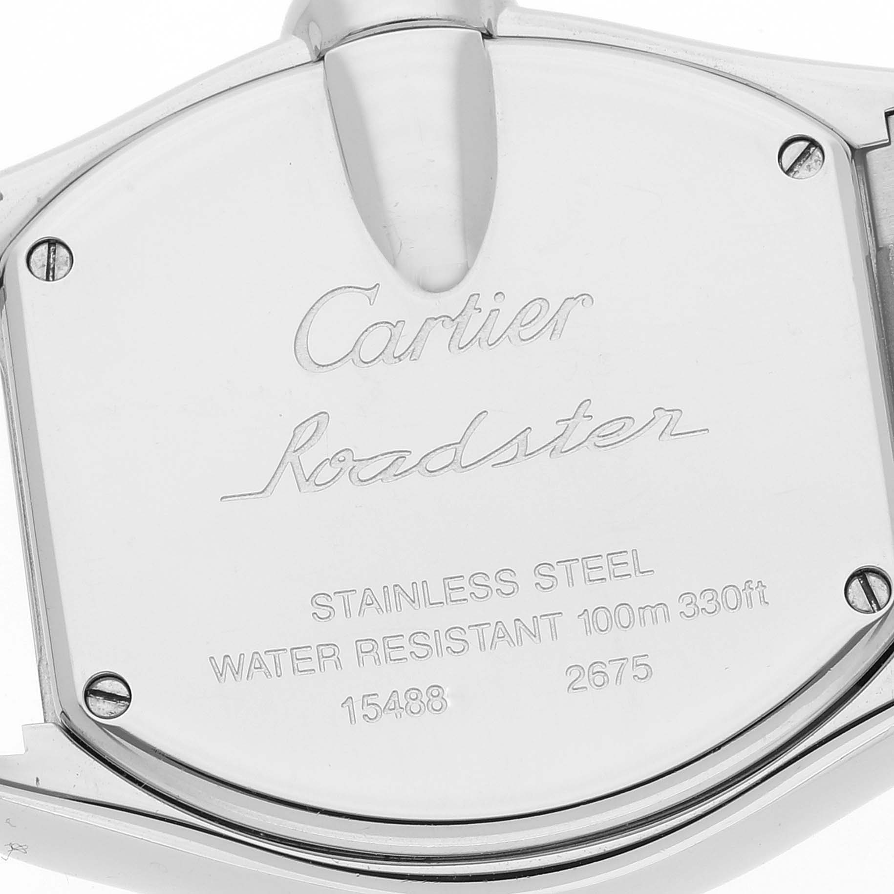 This image shows the stainless steel back case of a Cartier Roadster W62054V3 Women's Stainless Steel Pink Dial W62054V3 Women's Stainless Steel Pink Dial watch, highlighting its inscriptions and water resistance details.