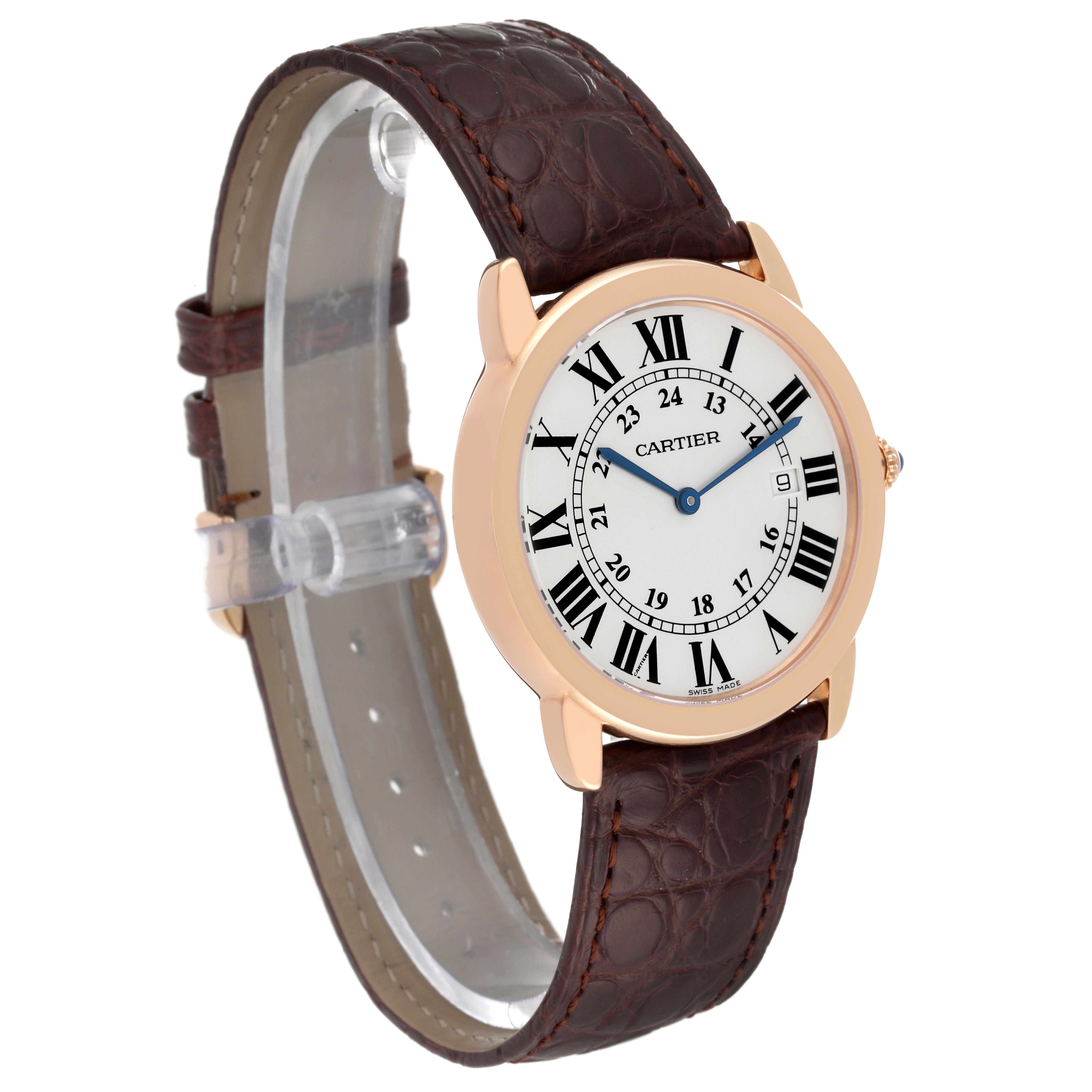 The Cartier Ronde W6701008 Men
s Steel and Gold (two tone) Silver Dial W6701008 Men
s Steel and Gold (two tone) Silver Dial watch is shown at a three-quarter angle displaying its round face and brown leather strap.